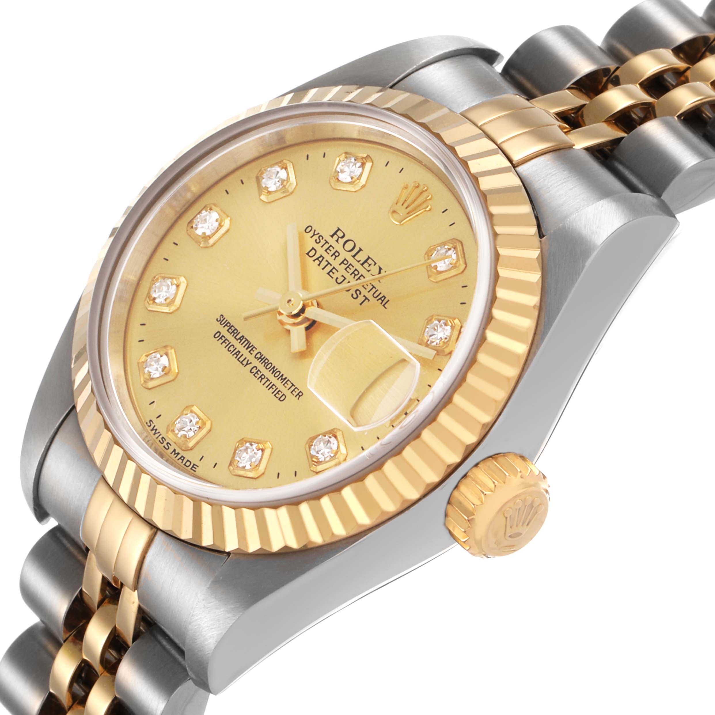 The Rolex Datejust 79173 Women's Steel and Gold (two tone) Champagne Dial watch is shown at a slight angle displaying the bezel, face, crown, and part of the bracelet.