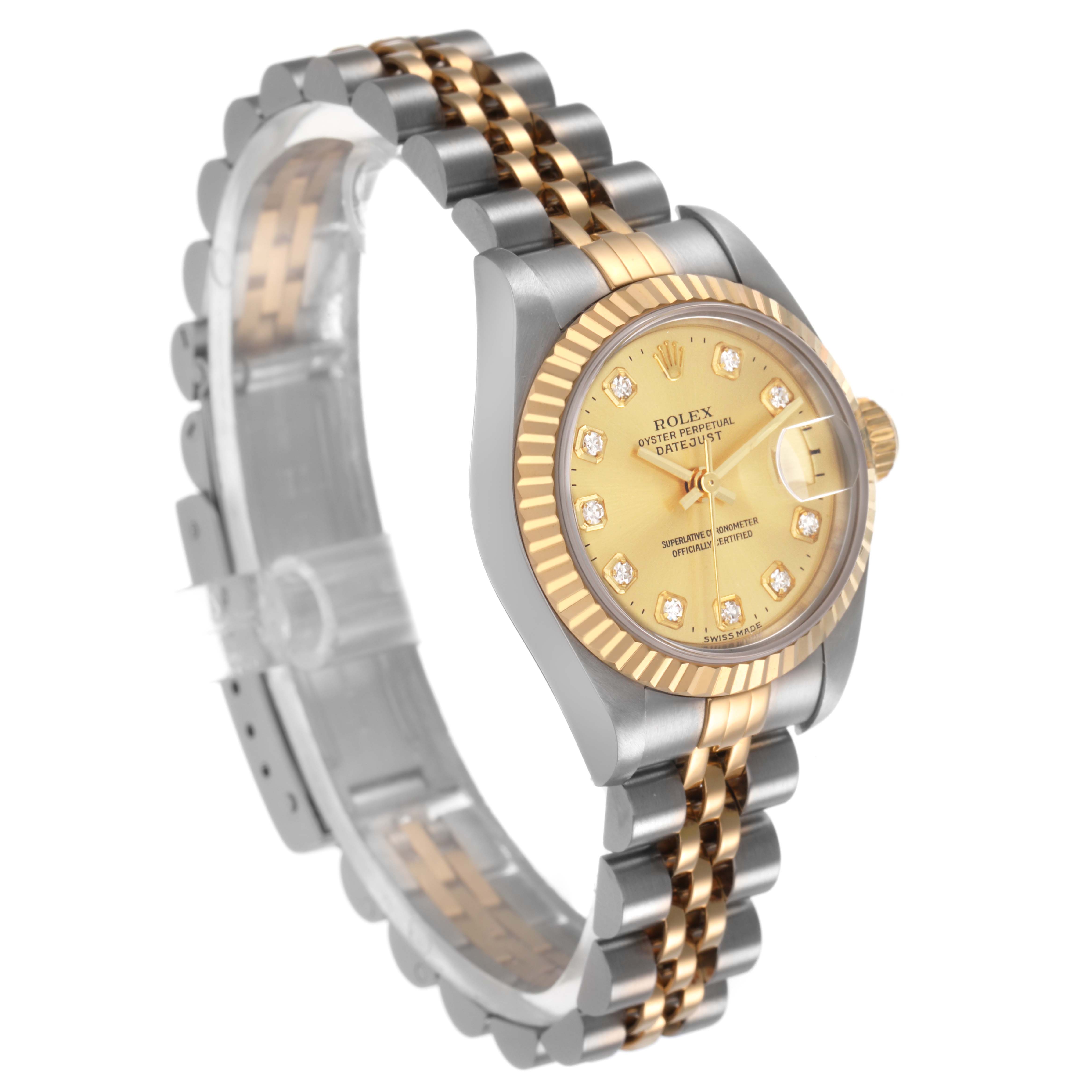 The Rolex Datejust 79173 Women's Steel and Gold (two tone) Champagne Dial watch is shown at a three-quarter angle, displaying the bezel, dial, bracelet, and clasp.