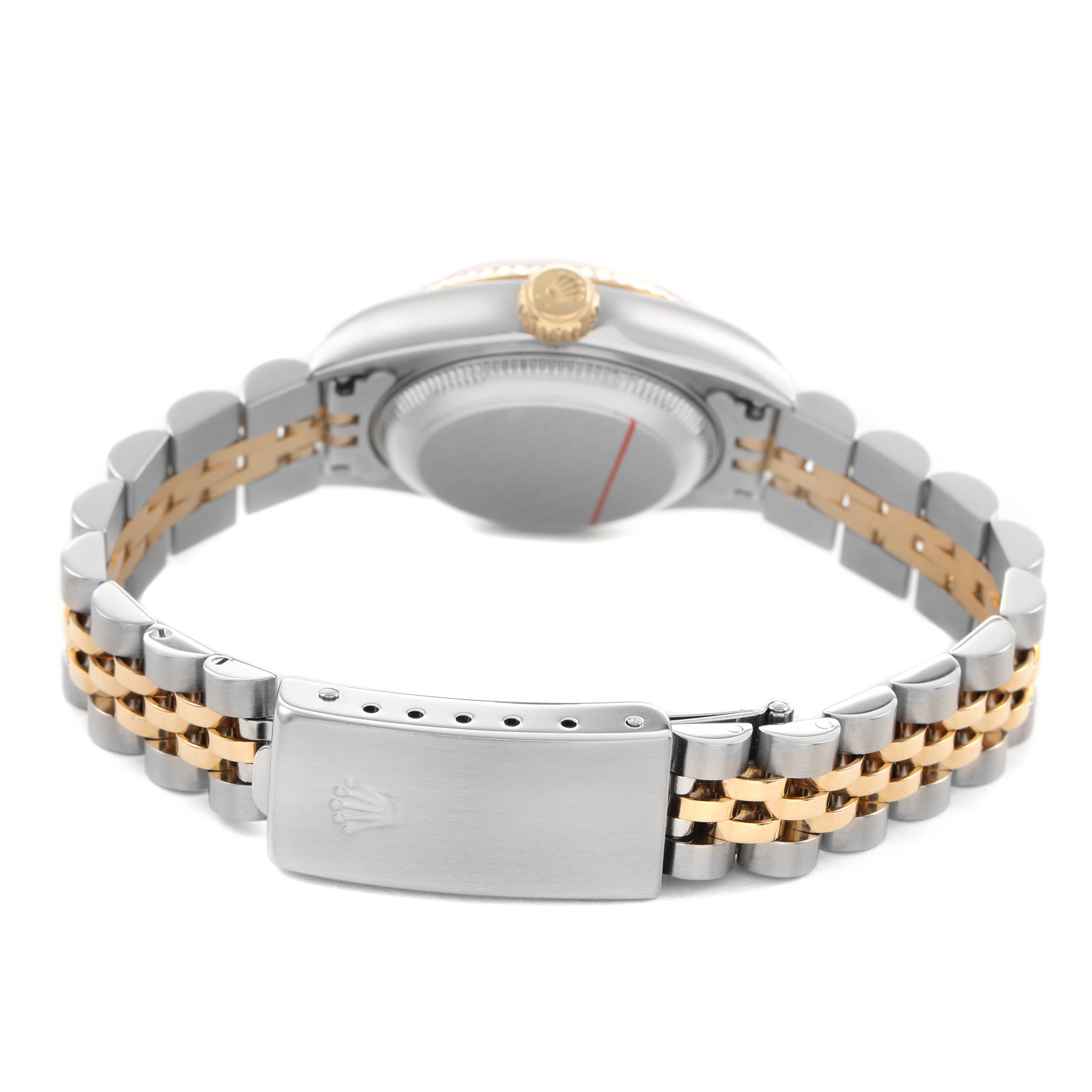 The image shows the back of a Rolex Datejust 79173 Women's Steel and Gold (two tone) Champagne Dial, highlighting the clasp, bracelet, case back, and crown from a low rear angle.