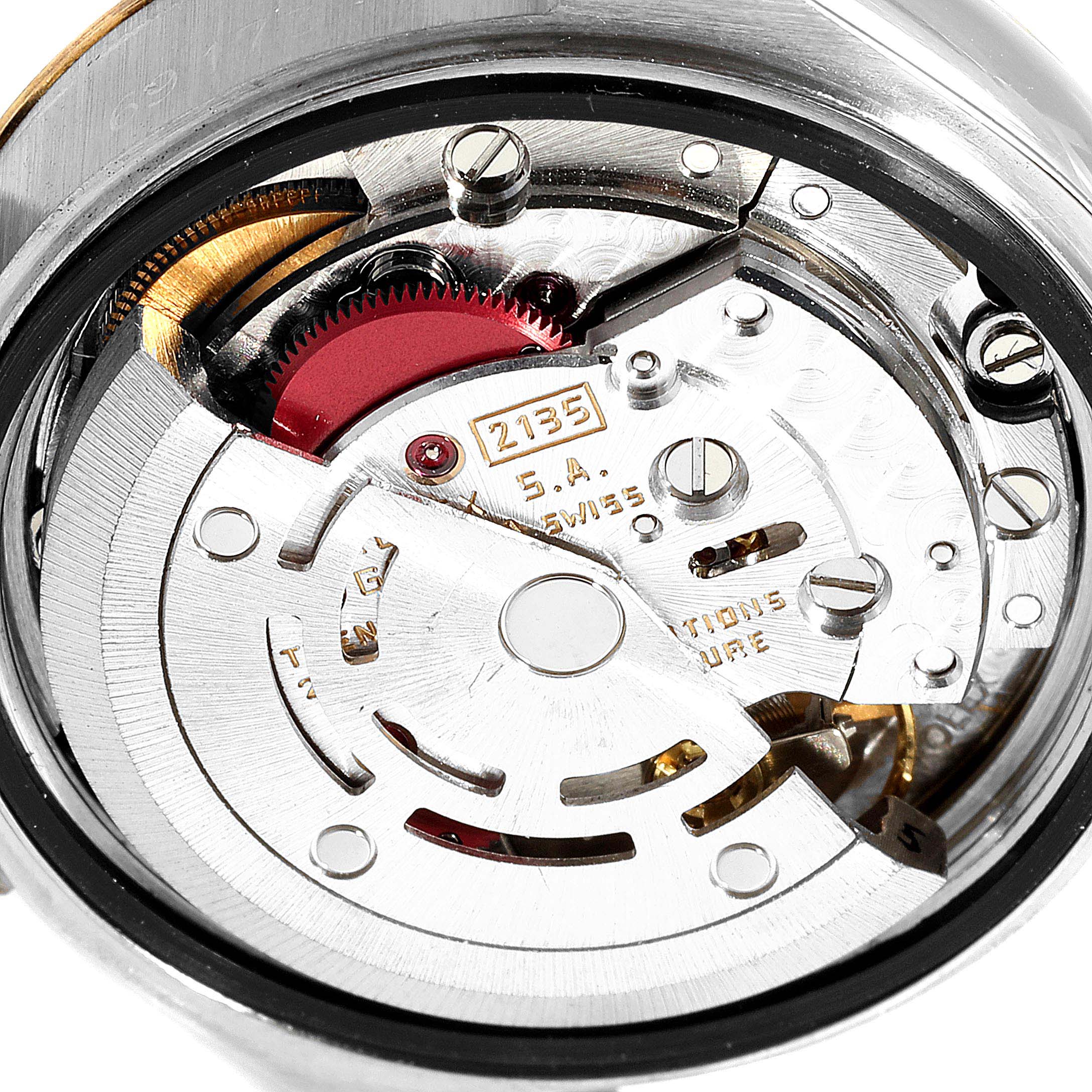 This image shows the internal mechanical movement and parts of a Rolex Datejust 69173 Women
s Steel and Gold (two tone) Champagne Dial 69173 Women
s Steel and Gold (two tone) Champagne Dial watch from a top-down angle.