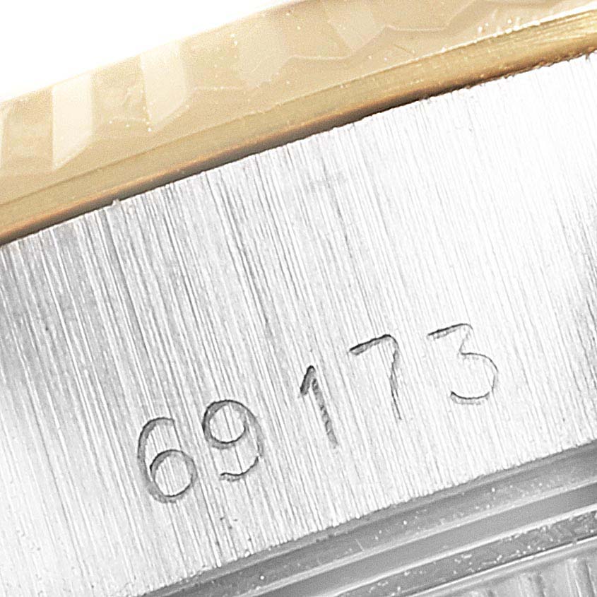 This is a close-up of the serial/model number "69173" engraved on the case of a Rolex Datejust 69173 Women
s Steel and Gold (two tone) Champagne Dial 69173 Women
s Steel and Gold (two tone) Champagne Dial watch.