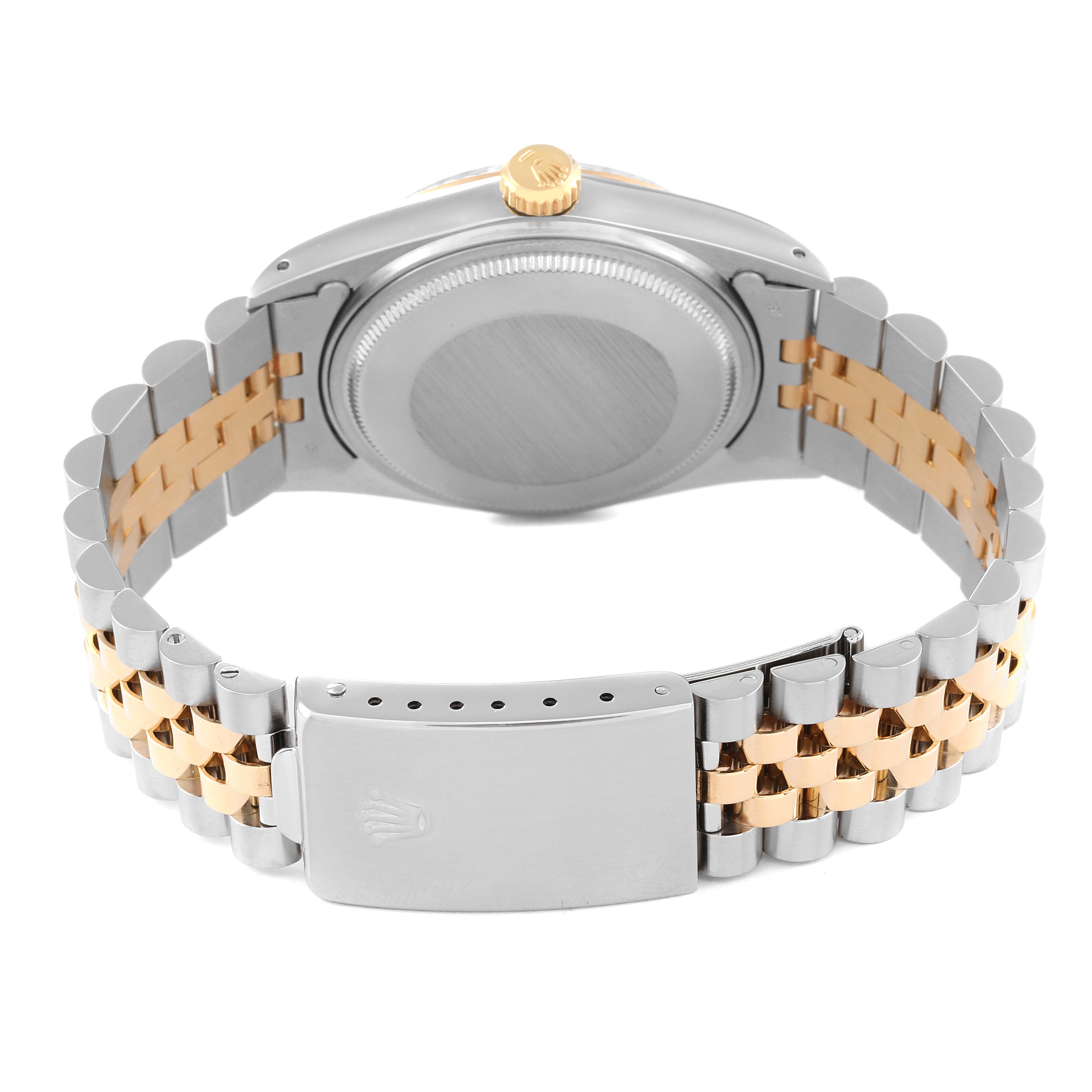 The image shows the back view of a Rolex Vintage Collection 16013 Men's Steel and Gold (two tone) Blue Dial 16013 Men's Steel and Gold (two tone) Blue Dial watch, highlighting its bi-metal bracelet and clasp.