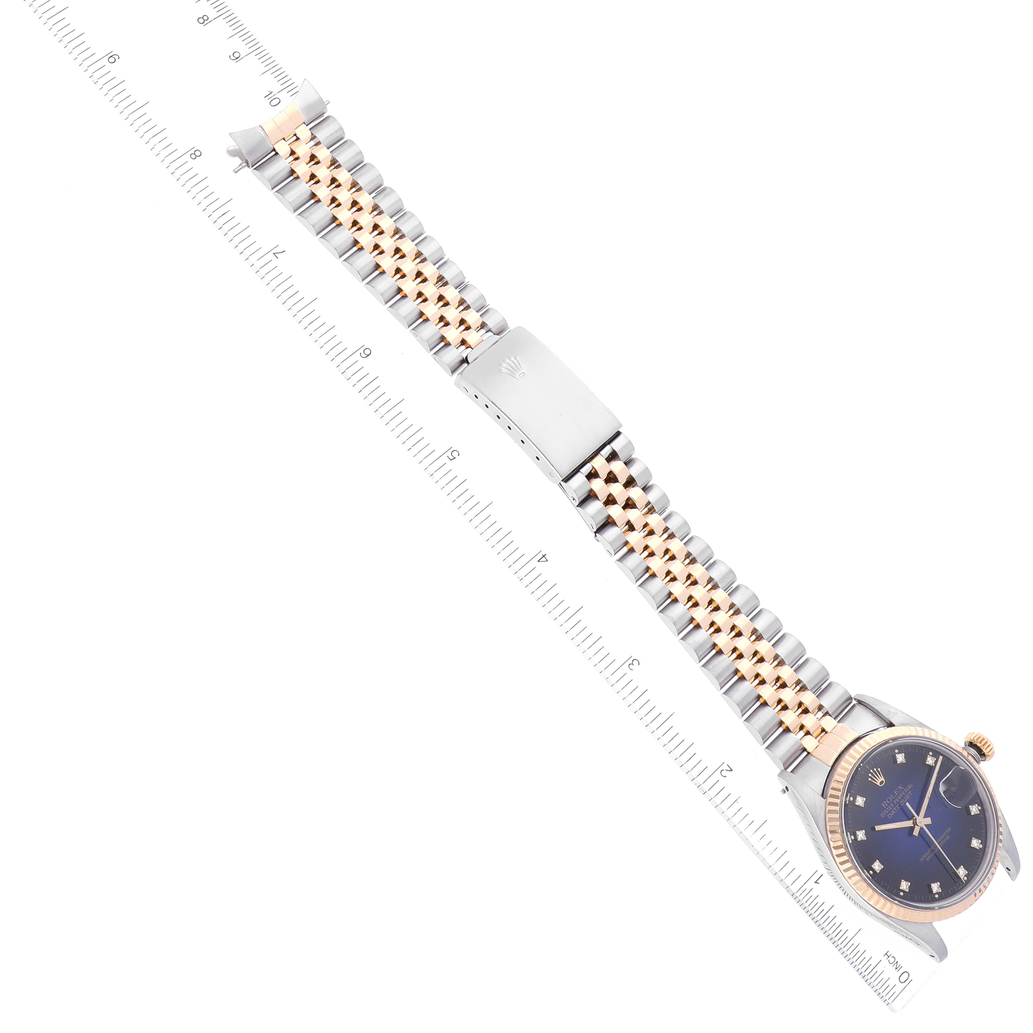 The image shows a Rolex Vintage Collection 16013 Men's Steel and Gold (two tone) Blue Dial 16013 Men's Steel and Gold (two tone) Blue Dial watch at a top-down angle, highlighting its face, band, and clasp.