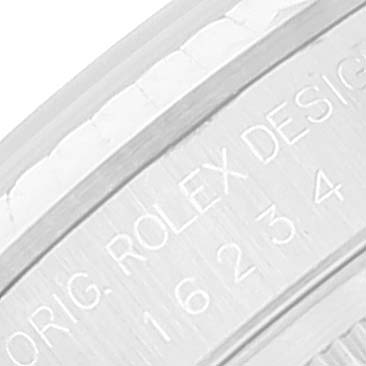 This image shows a close-up of the engraved inner case of a Rolex Datejust 16234 Men's Stainless Steel Blue Dial 16234 Men's Stainless Steel Blue Dial watch.