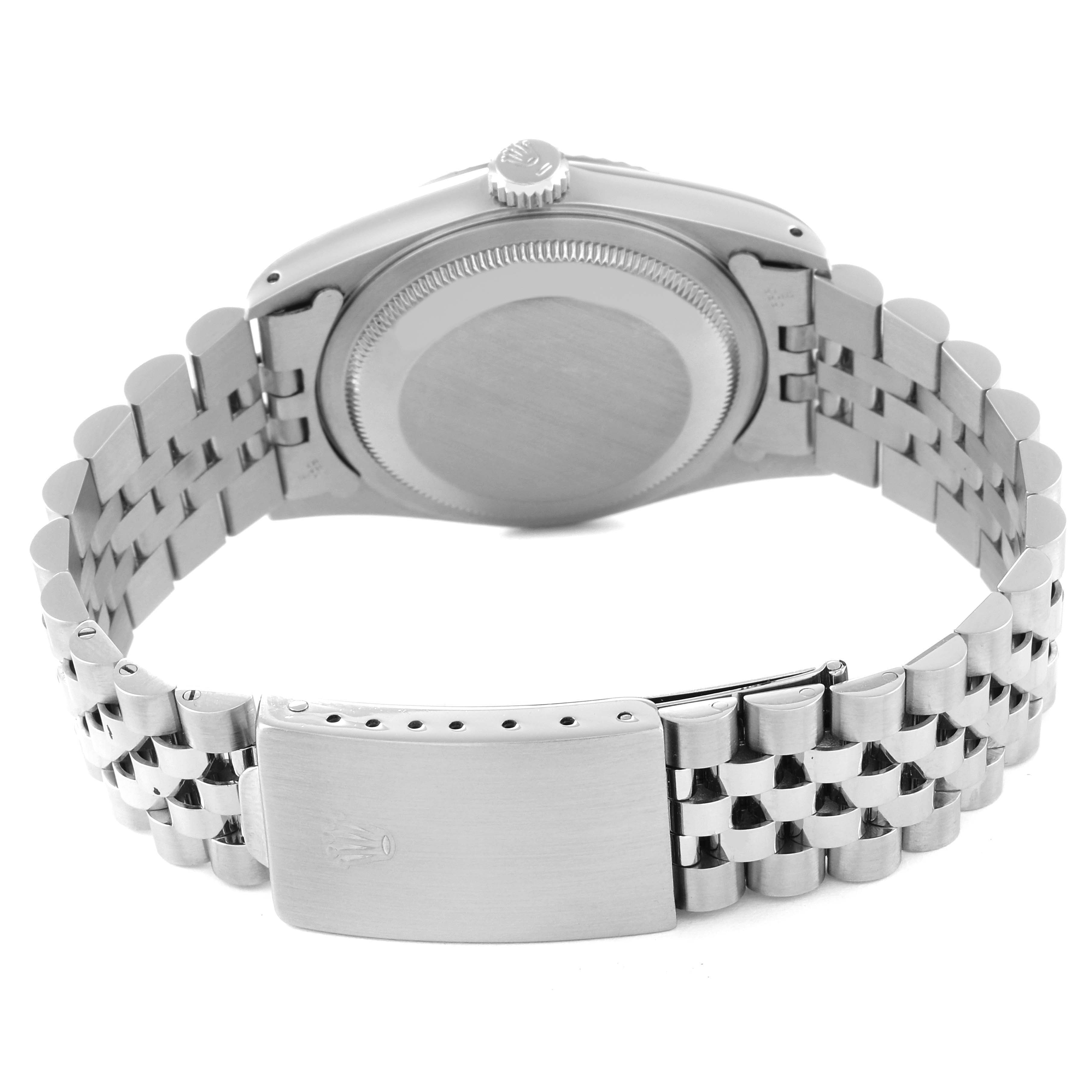 The image shows the back view of a Rolex Datejust 16234 Men's Stainless Steel Blue Dial 16234 Men's Stainless Steel Blue Dial watch, highlighting its case back, crown, and Jubilee bracelet with clasp.