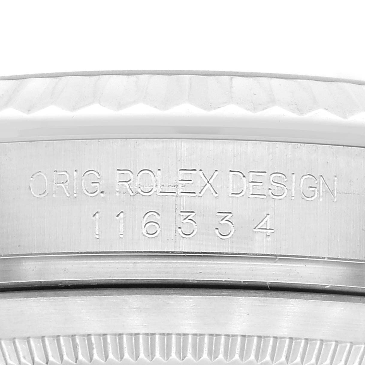 This image shows a close-up of the engravings on the side of a Rolex Datejust 41 116334 Men
s Stainless Steel Blue Dial 116334 Men
s Stainless Steel Blue Dial watch case.