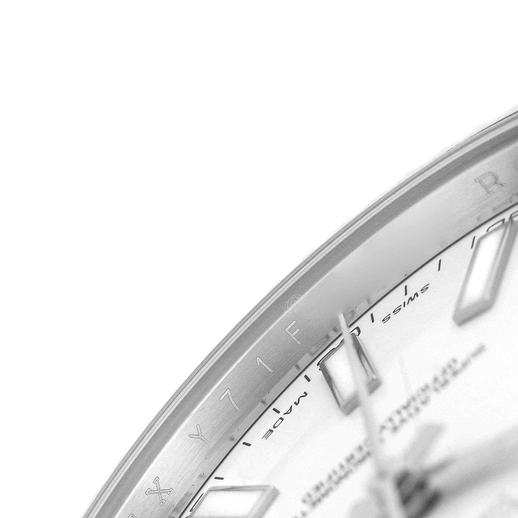 The image shows a close-up angle of the Rolex Datejust 41 116334 Mens Stainless Steel White Dial, focusing on part of the dial and inner bezel.