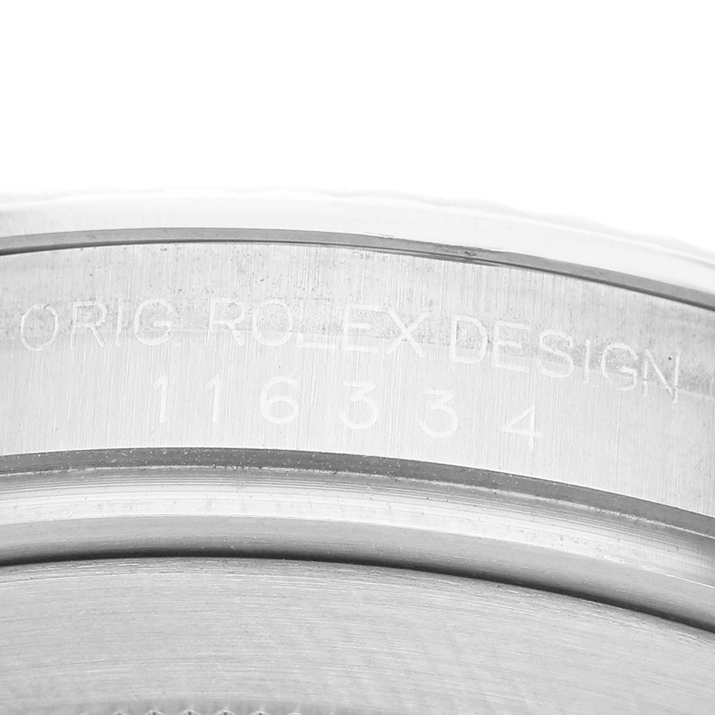 The image shows a close-up of the Datejust 41 model by Rolex focusing on the engraved inner bezel.
