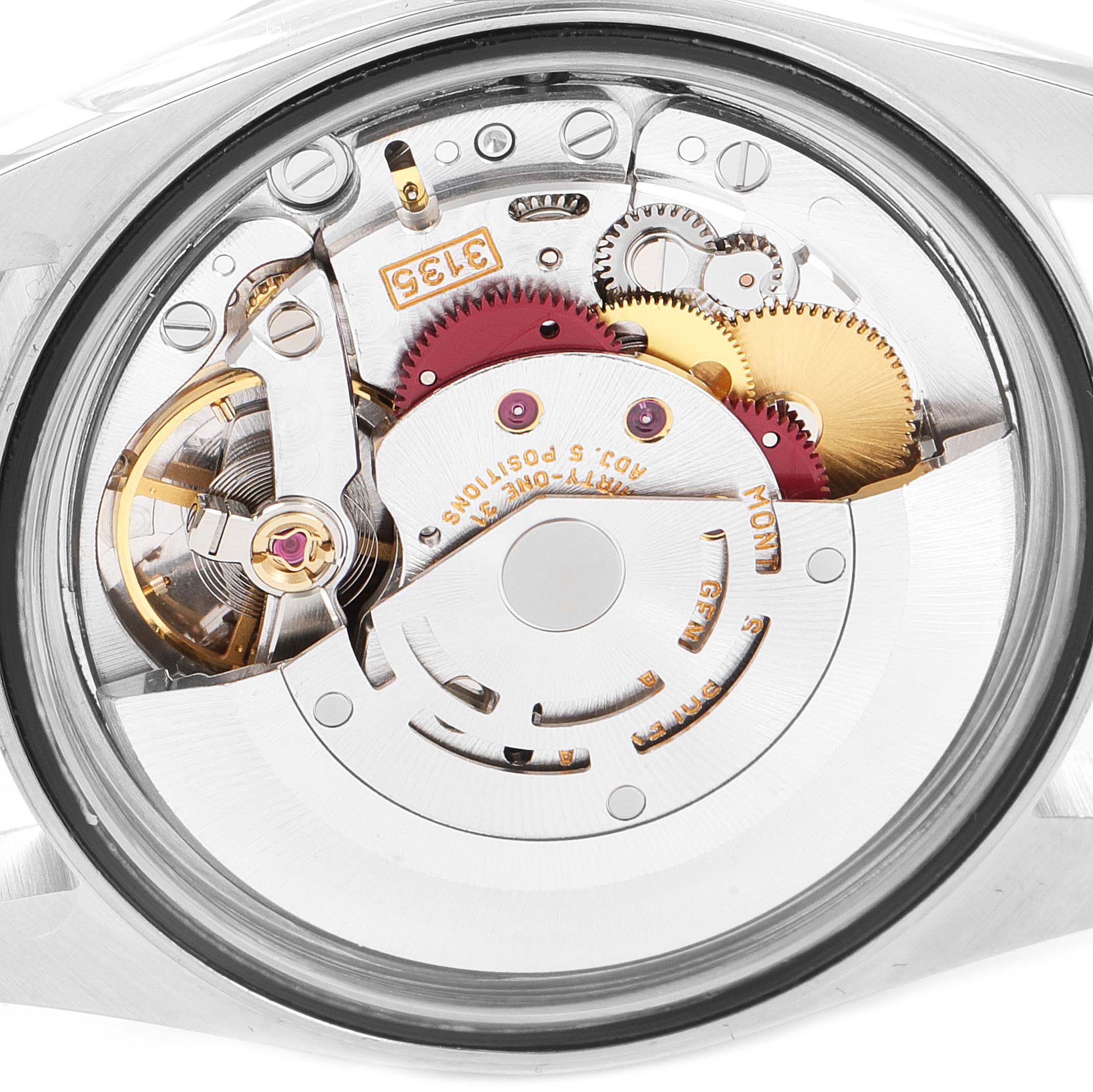 This is a close-up view of the movement of a Rolex Datejust 16233 Men's Steel and Gold (two tone) Champagne Dial 16233 Men's Steel and Gold (two tone) Champagne Dial watch, showcasing its intricate gears and mechanisms.