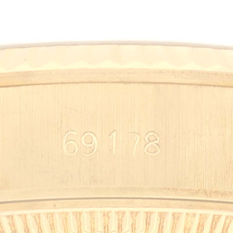 This image shows a close-up of the model number "69178" on the band of the Rolex President 69178 Women
s Yellow Gold Champagne Dial 69178 Women
s Yellow Gold Champagne Dial watch.