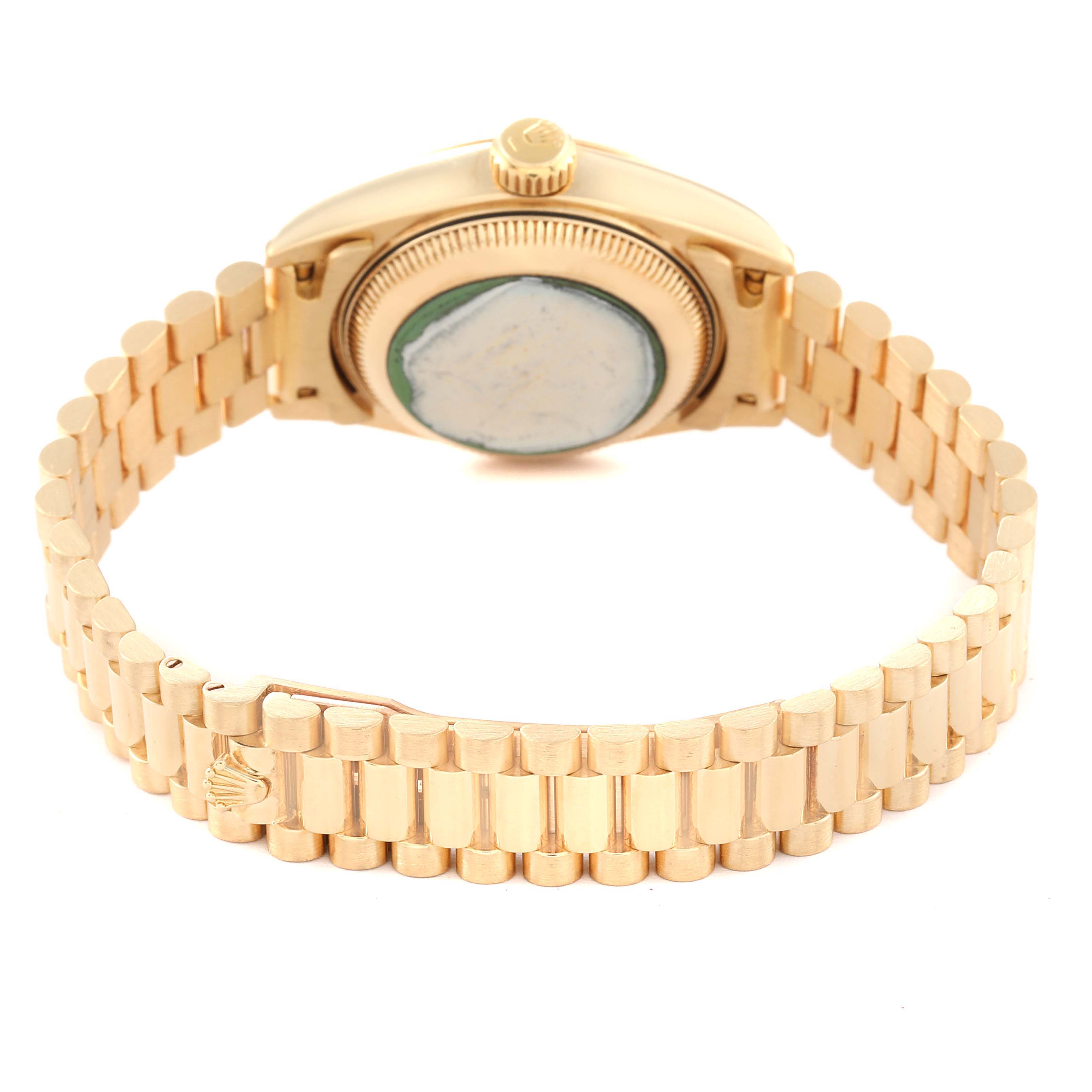 The image shows the back view of a Rolex President 69178 Women
s Yellow Gold Champagne Dial 69178 Women
s Yellow Gold Champagne Dial model watch, highlighting the case and the bracelet.