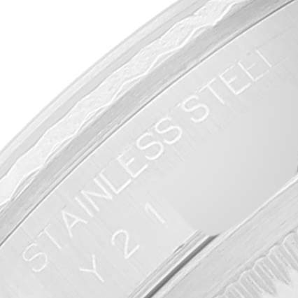 This image shows a close-up of the "STAINLESS STEEL" engraving on the case of a Rolex Datejust 16234 Men
s Stainless Steel Black Dial 16234 Men
s Stainless Steel Black Dial model.