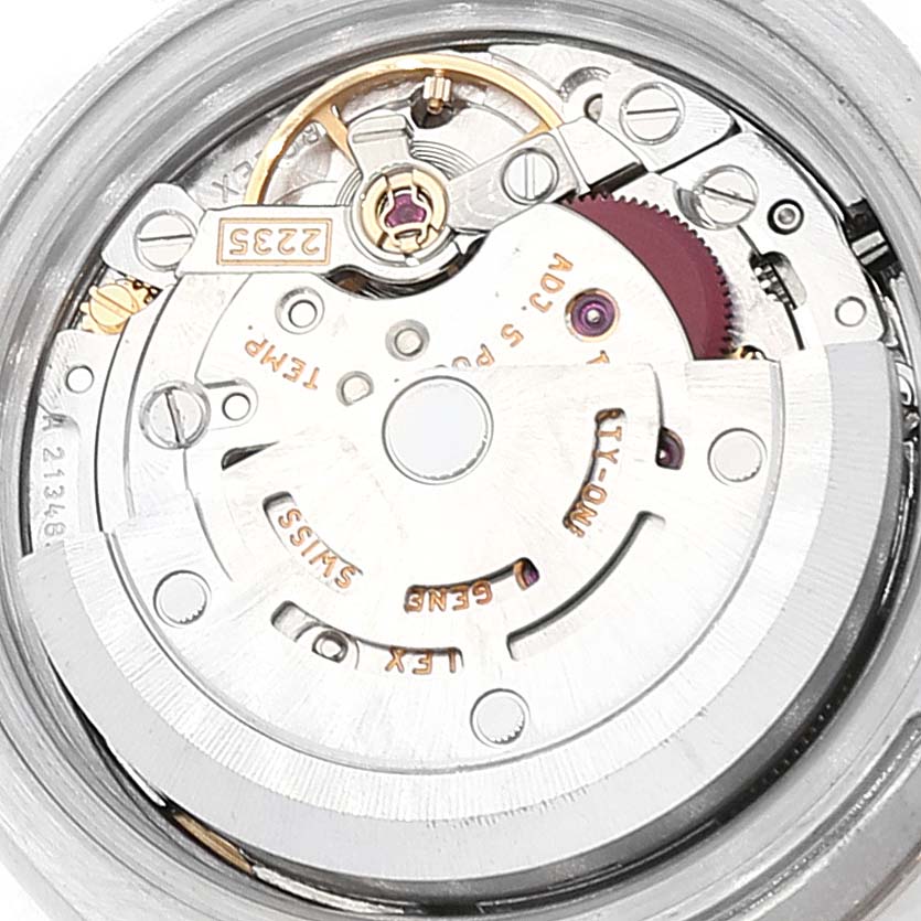 The image shows the intricate internal mechanical movement of a Rolex Datejust 179174 Women
s Stainless Steel Mother of Pearl Dial 179174 Women
s Stainless Steel Mother of Pearl Dial watch, viewed from the back.
