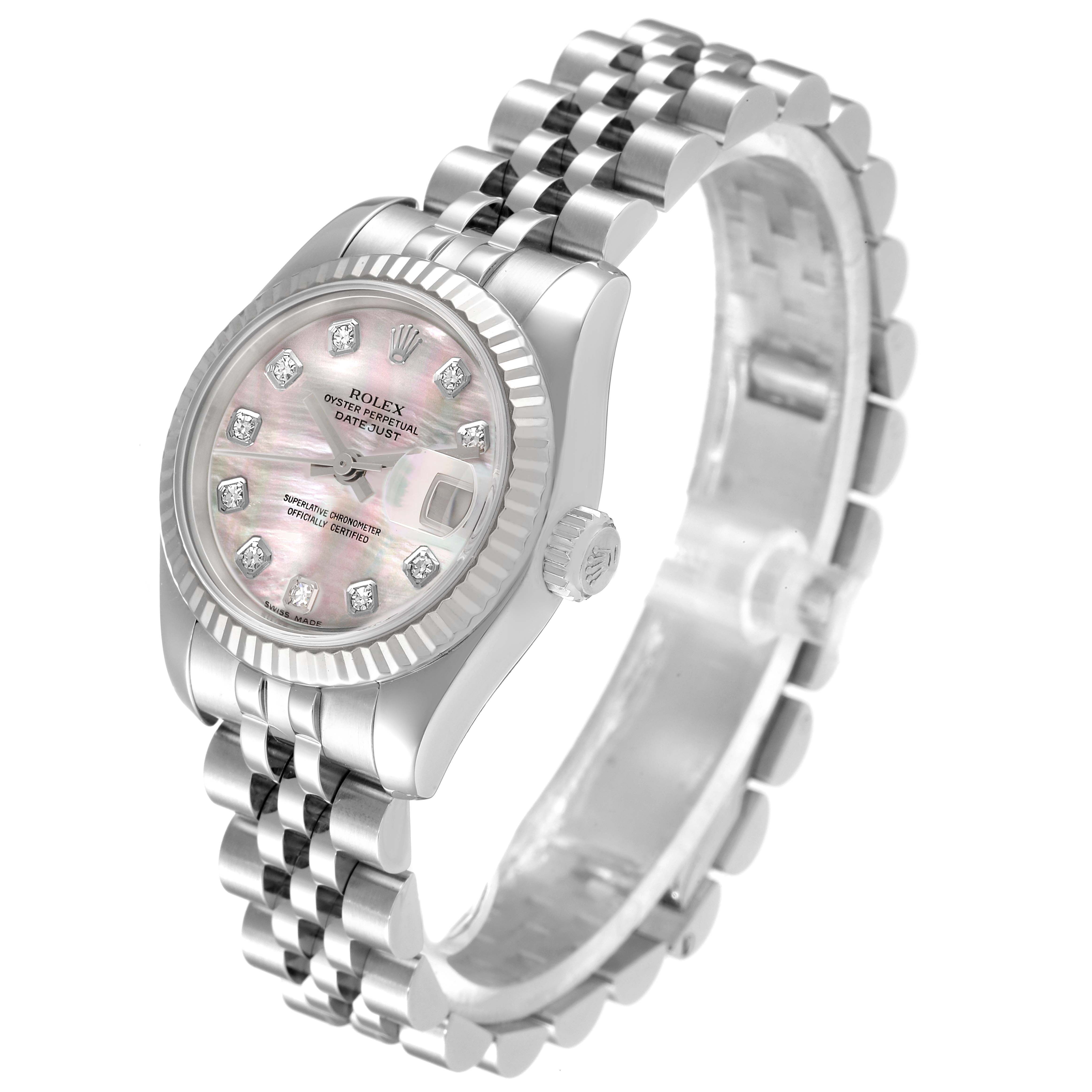 This image shows a Rolex Datejust 179174 Women
s Stainless Steel Mother of Pearl Dial 179174 Women
s Stainless Steel Mother of Pearl Dial watch from an angled perspective, highlighting its dial, crown, and bracelet.