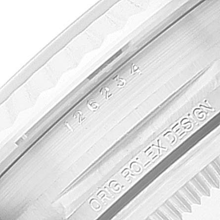 The image shows a close-up of the inner bezel and engraved details of a Rolex Datejust 126234 Men
s Stainless Steel Pink Dial 126234 Men
s Stainless Steel Pink Dial watch.