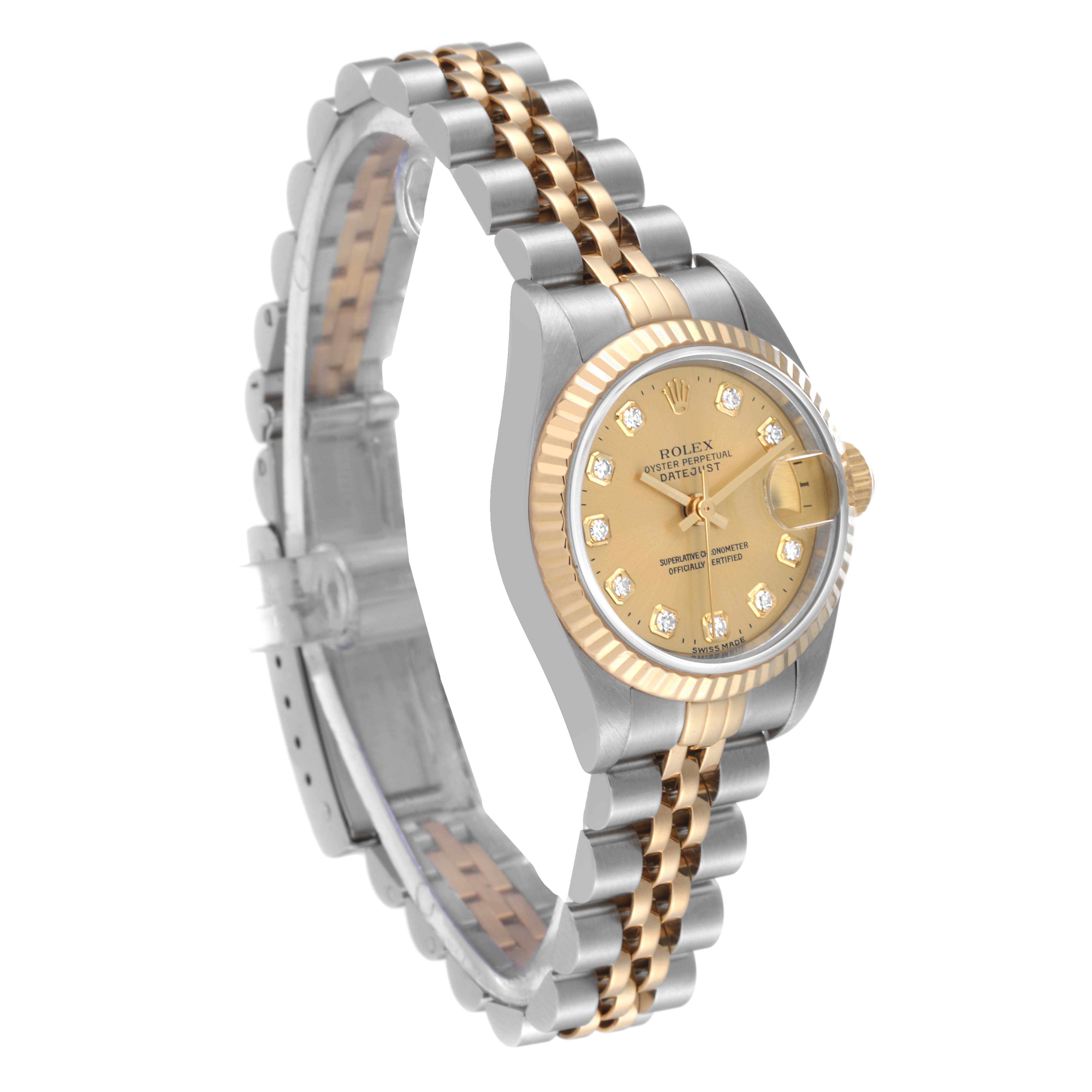 The Rolex Datejust 69173 Women's Steel and Gold (two tone) Champagne Dial 69173 Women's Steel and Gold (two tone) Champagne Dial watch is shown at a slight angle, highlighting its gold and silver bracelet and diamond-studded dial.