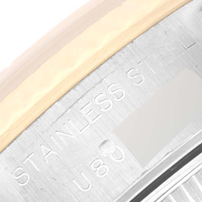 The image shows a close-up of the engraved stainless steel caseback of a Rolex Datejust 69173 Women's Steel and Gold (two tone) Champagne Dial 69173 Women's Steel and Gold (two tone) Champagne Dial watch.