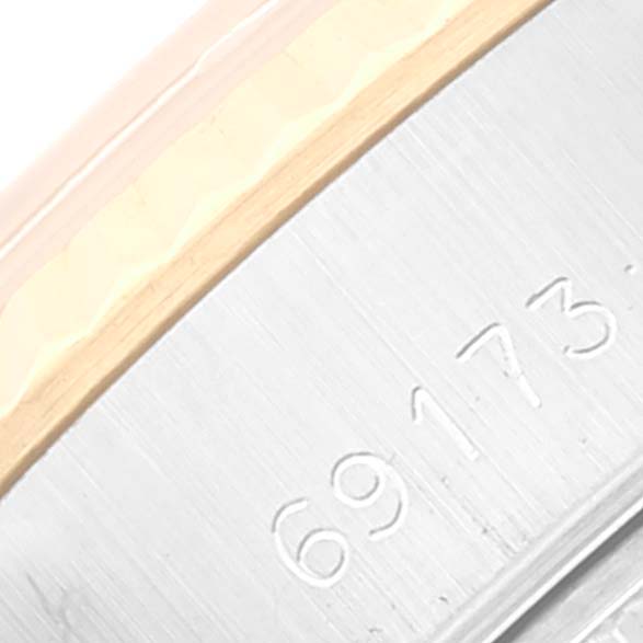 The image shows a close-up of the case part with the model number 69173 engraved on a Rolex Datejust 69173 Women's Steel and Gold (two tone) Champagne Dial 69173 Women's Steel and Gold (two tone) Champagne Dial watch.