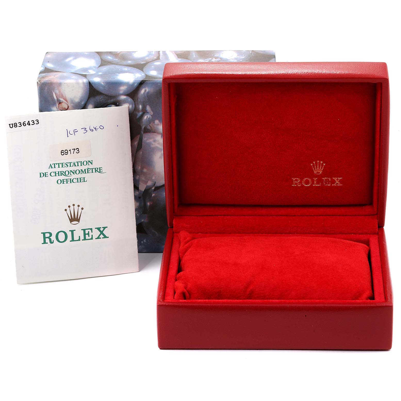 This image shows a red Rolex Datejust 69173  Women
s Steel and Gold (two tone) Champagne Dial 69173  Women
s Steel and Gold (two tone) Champagne Dial watch box and an official certificate, viewed from the front.