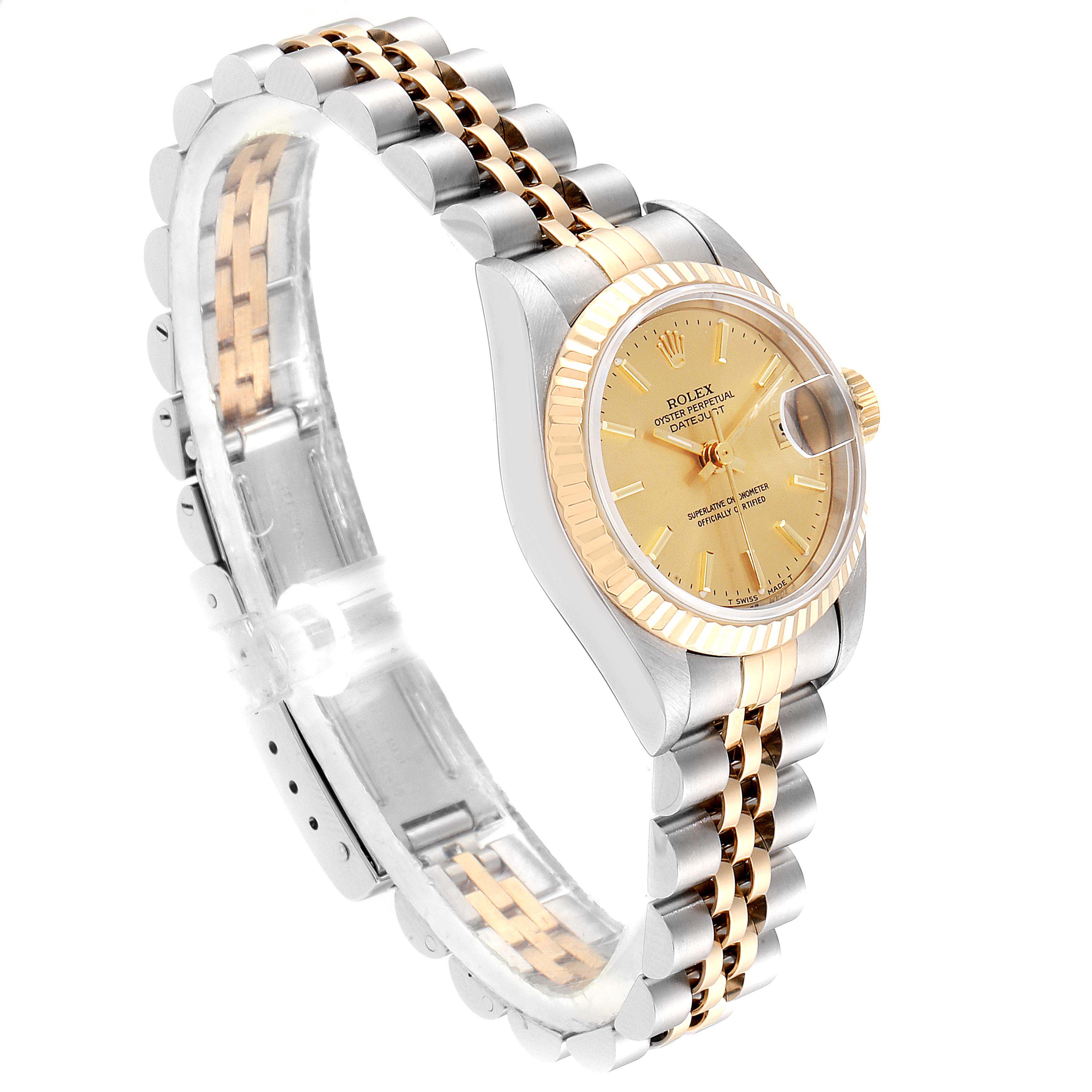 This image shows a Rolex Datejust 69173  Women
s Steel and Gold (two tone) Champagne Dial 69173  Women
s Steel and Gold (two tone) Champagne Dial watch at an angle emphasizing the bracelet, bezel, dial, and case.