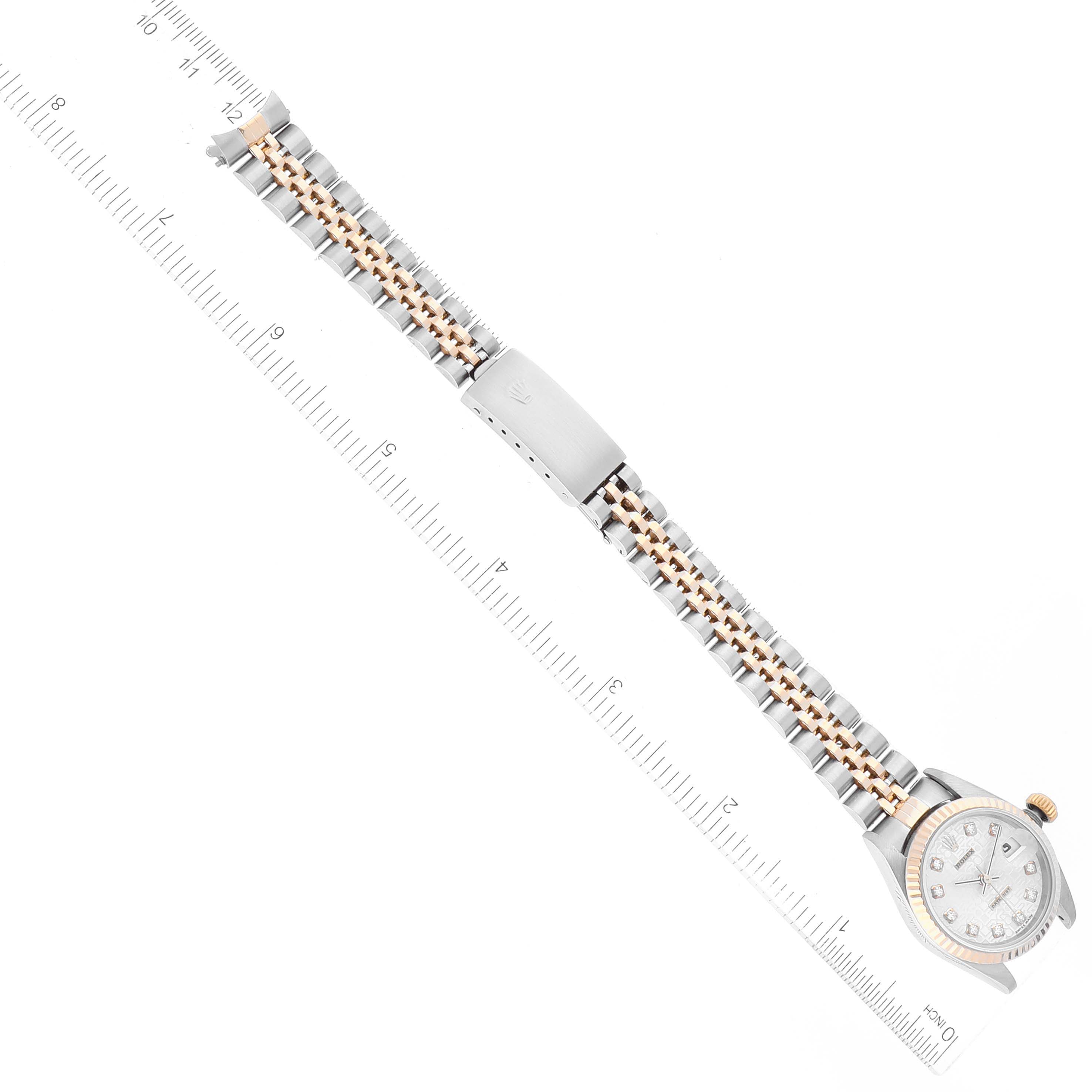 The Rolex Datejust 79173 Women's Stainless Steel Silver Dial 79173 Women's Stainless Steel Silver Dial watch is shown diagonally, displaying its face, bezel, and complete bracelet with the clasp.