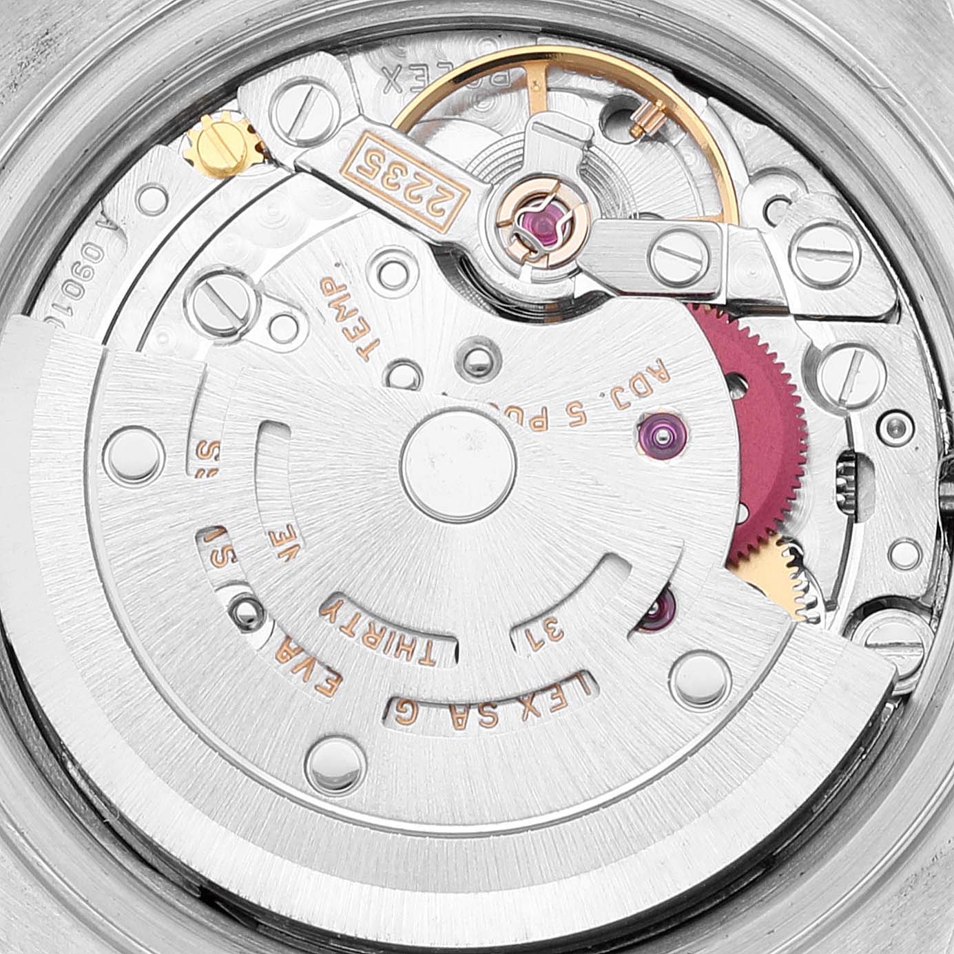 The image shows the inner mechanism of a Rolex Datejust 79173 Women's Stainless Steel Silver Dial 79173 Women's Stainless Steel Silver Dial watch, focusing on the rotor and movement parts.