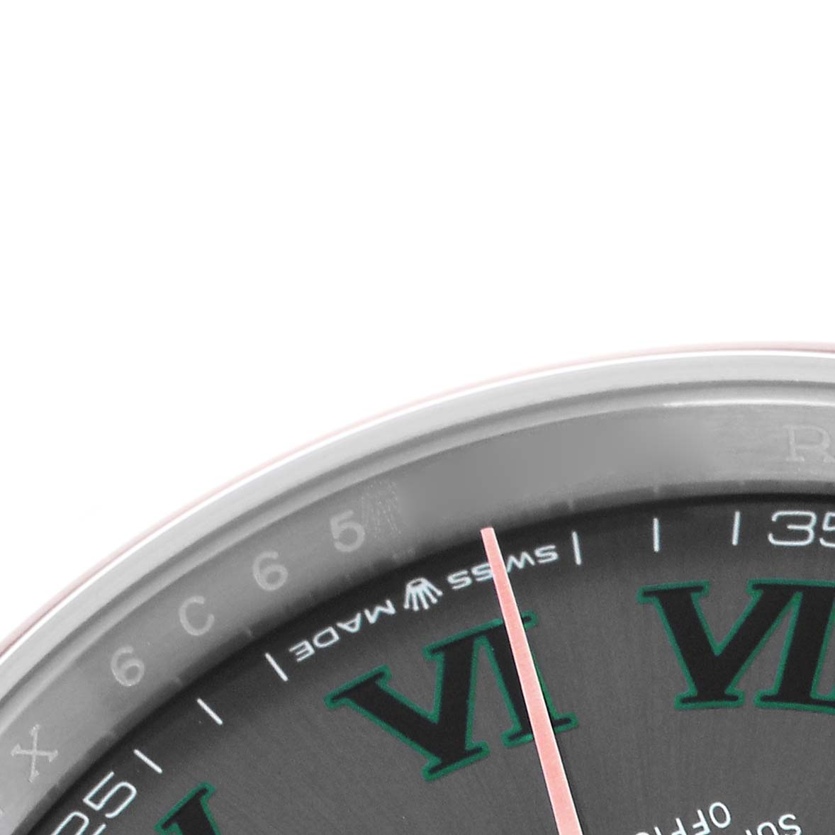 This image shows the upper portion of the Rolex Datejust 126203 Men
s Steel and Gold (two tone) Grey Dial 126203 Men
s Steel and Gold (two tone) Grey Dial dial, featuring the bezel, part of the second hand, and Roman numeral VI.