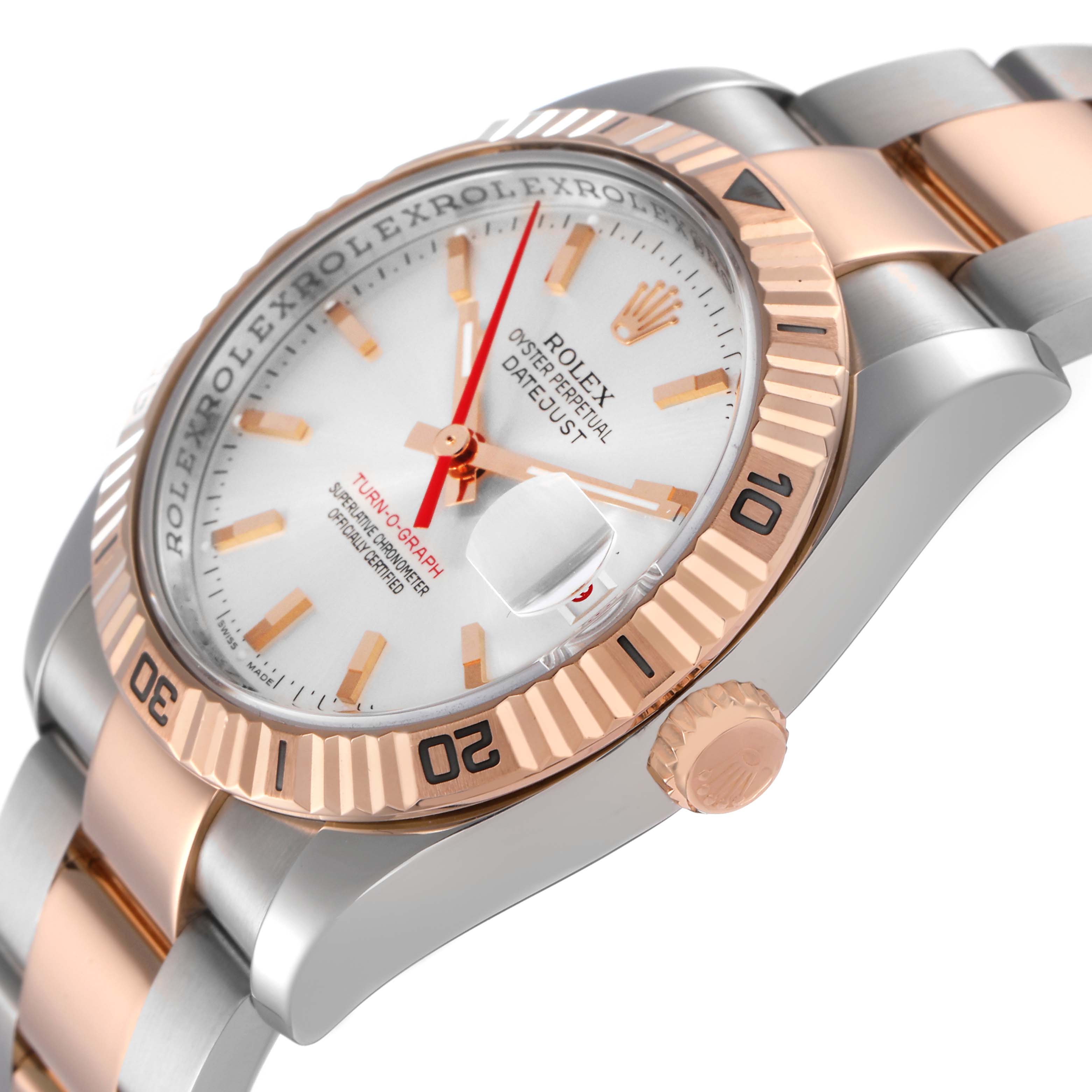 The Rolex Turn-o-Graph 116261 Men
s Steel and Gold (two tone) Silver Dial 116261 Men
s Steel and Gold (two tone) Silver Dial watch is shown angled from the side, highlighting the bezel, crown, and part of the bracelet.