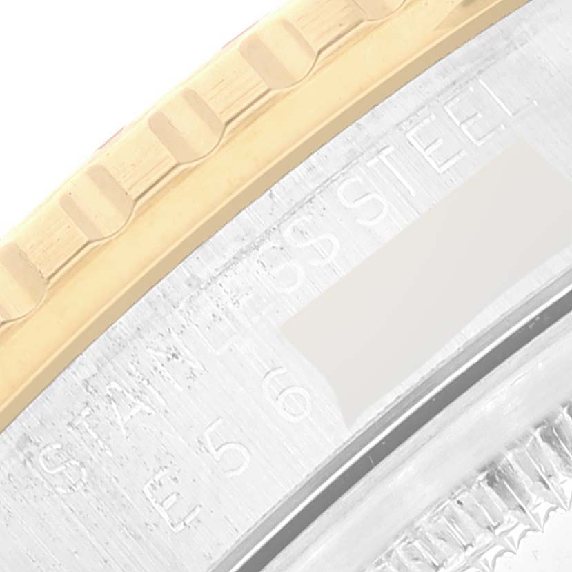 The image shows a close-up of the stainless steel and gold bezel on a Rolex Turn-o-Graph 16263 Men's Steel and Gold (two tone) Champagne Dial 16263 Men's Steel and Gold (two tone) Champagne Dial watch.