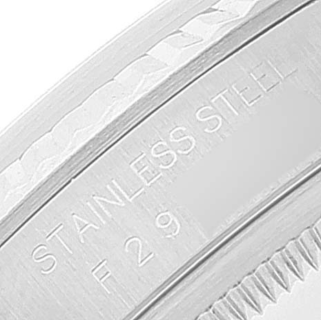 This image shows a close-up angle of the case back engraving on a Rolex Datejust 16234 Men's Stainless Steel White Dial 16234 Men's Stainless Steel White Dial, indicating "STAINLESS STEEL."
