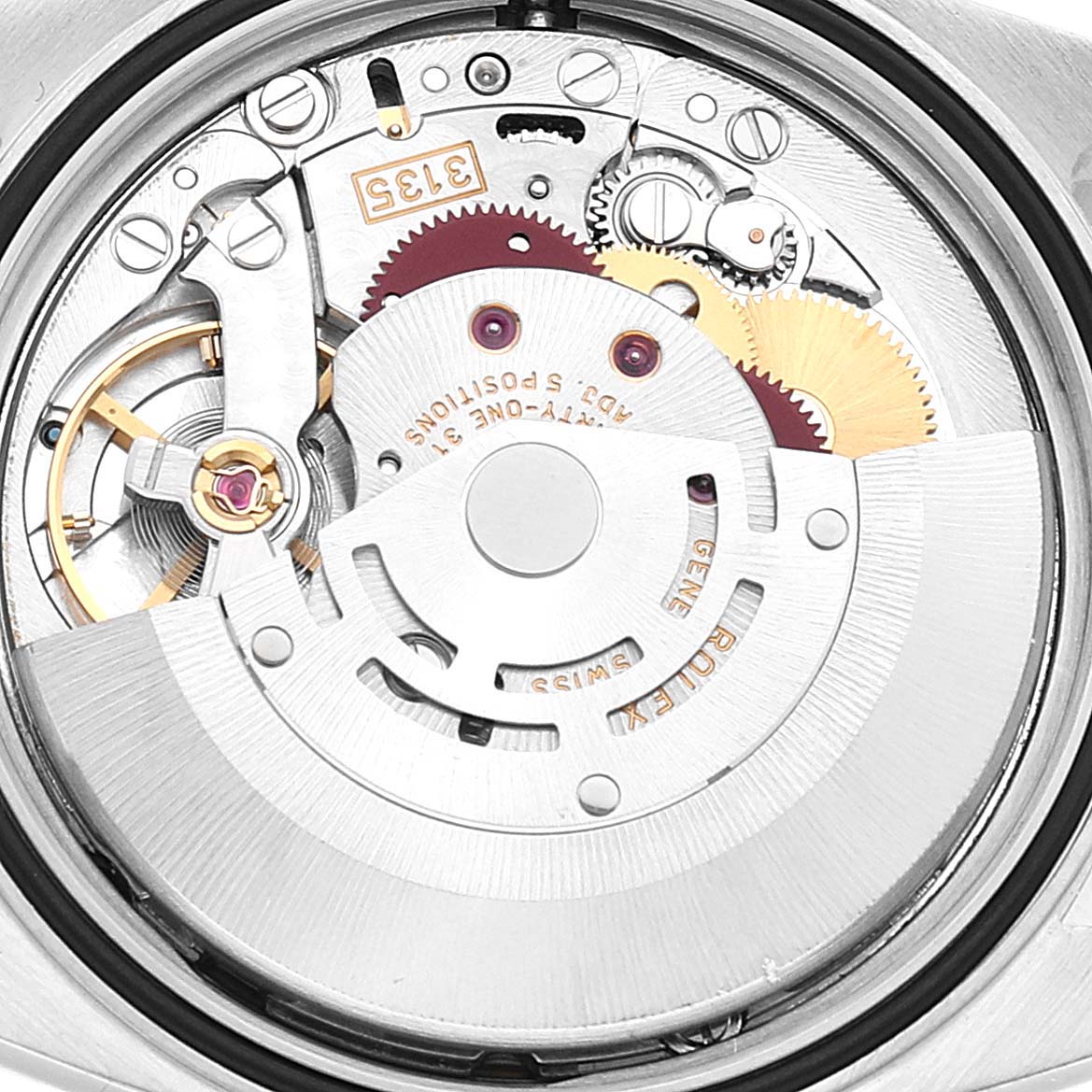 The image shows the internal mechanism of a Rolex Datejust 16234 Men's Stainless Steel White Dial 16234 Men's Stainless Steel White Dial watch, viewed from the back, revealing the gears and rotor.