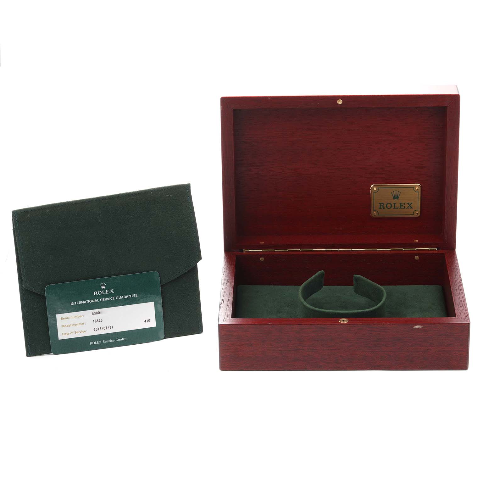 The image shows a Rolex Daytona 16523 Men
s Steel and Gold (two tone) White Dial 16523 Men
s Steel and Gold (two tone) White Dial watch box with a green service pouch and certificate, viewed from above.