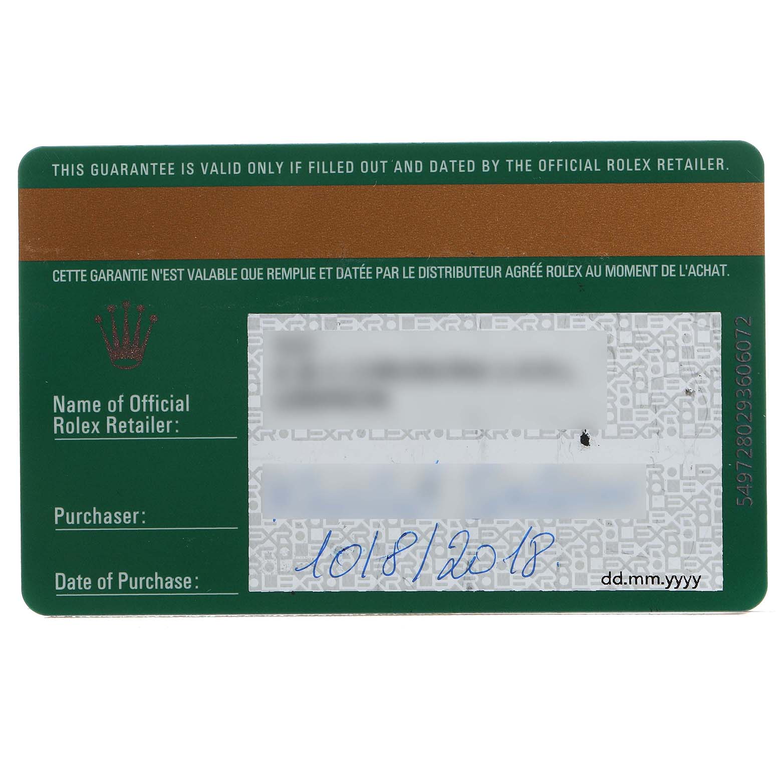 This is a close-up of the warranty card for the Rolex Daytona 116508 Mens Yellow Gold Green Dial watch.