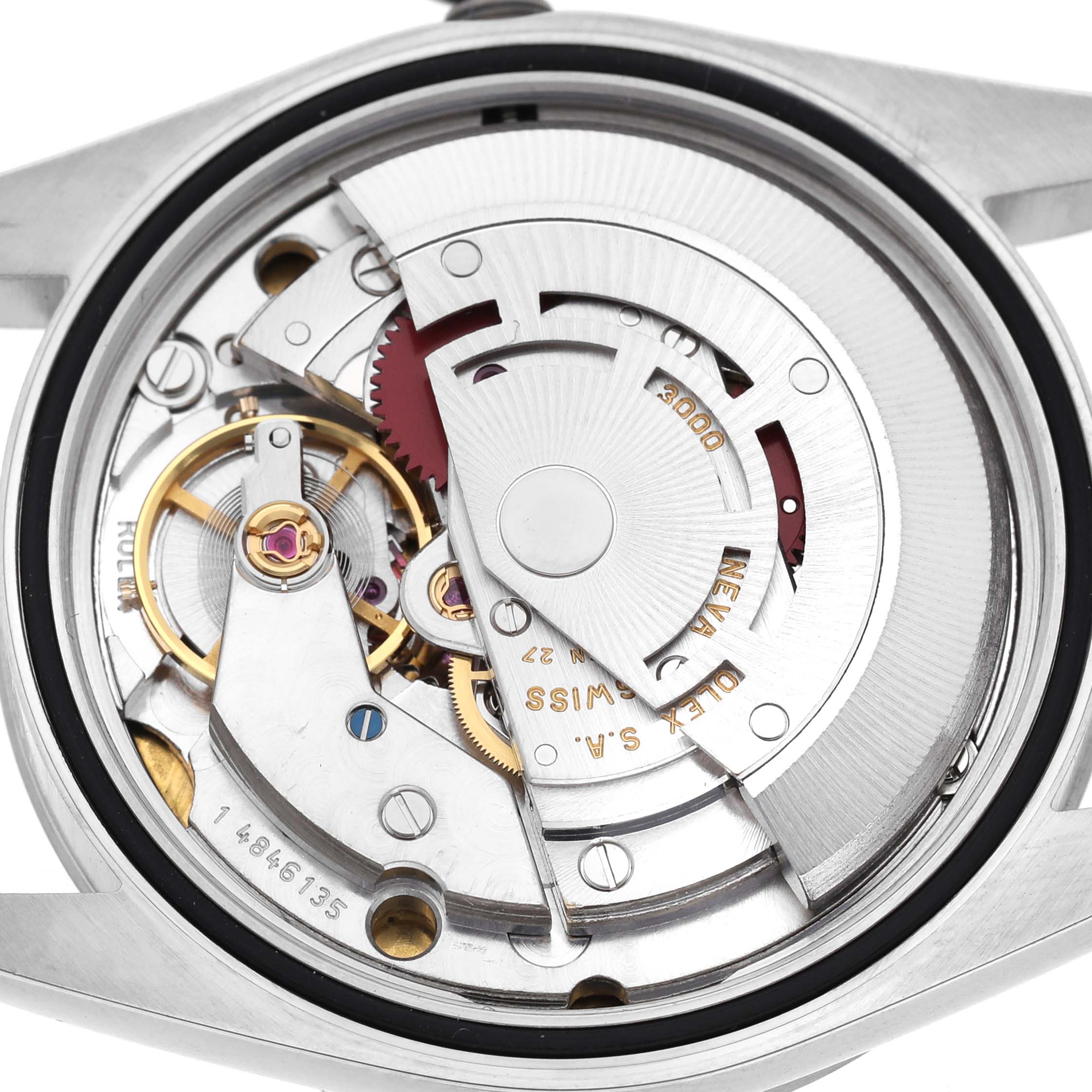 The Rolex Explorer 14270 Men's Stainless Steel Black Dial watch is shown from the back, revealing its intricate movement and rotor.