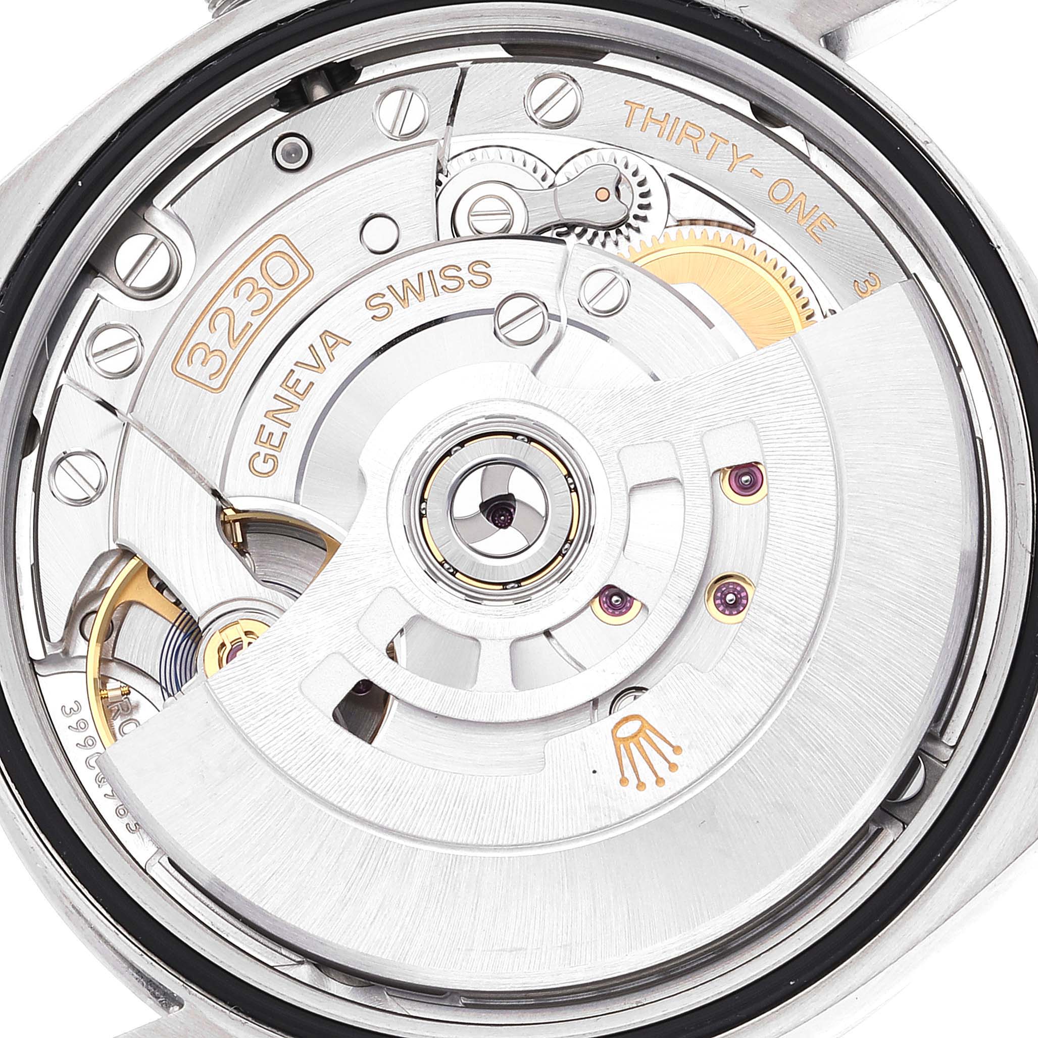 The image shows a close-up of the Rolex Explorer 124270 Men
s Stainless Steel Black Dial 124270 Men
s Stainless Steel Black Dial
s movement from the back, displaying the intricate inner mechanics.