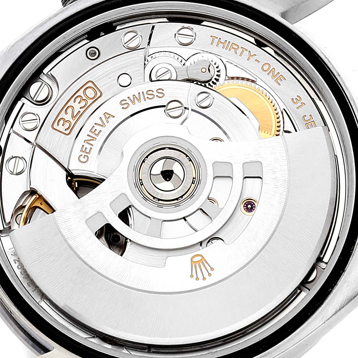 This image shows the internals of a Rolex Explorer 124270 Men's Stainless Steel Black Dial 124270 Men's Stainless Steel Black Dial watch, specifically the movement and intricate parts of the mechanism.