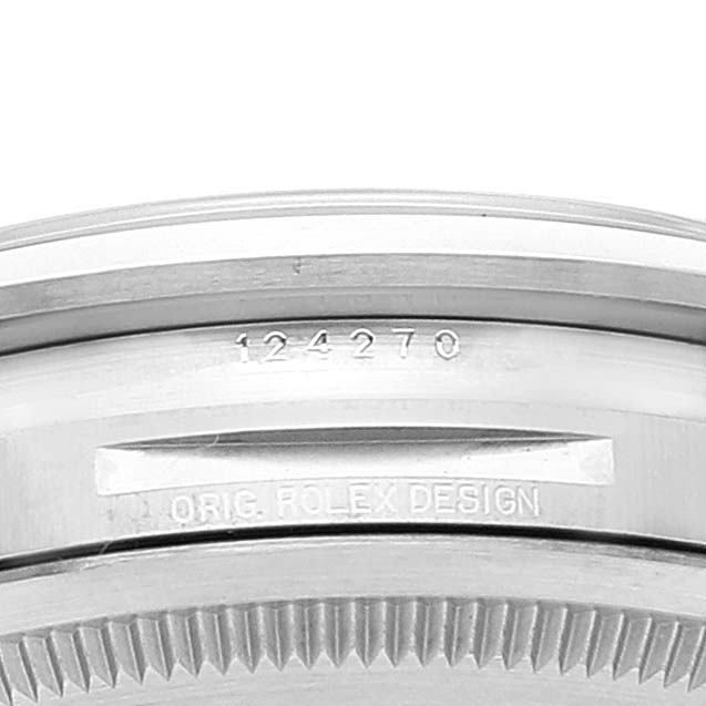 The image shows a close-up angle of the case rim and serial number for the Rolex Explorer 124270 Men's Stainless Steel Black Dial 124270 Men's Stainless Steel Black Dial.