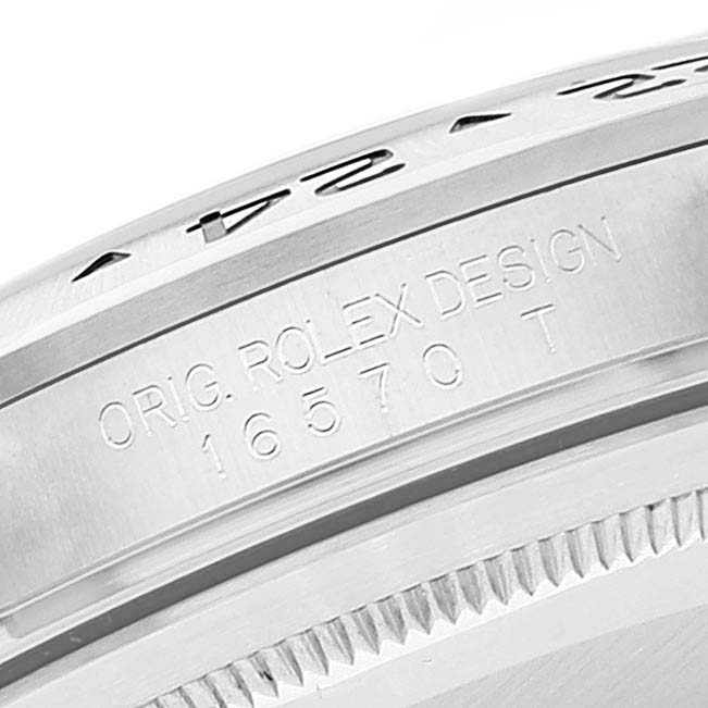 The image shows a close-up of a Rolex Explorer 16570 Men's Stainless Steel White Dial 16570 Men's Stainless Steel White Dial model's bezel and case, highlighting the engraved design and model number.