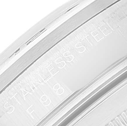 This image shows a close-up of the engraved stainless steel bezel of a Rolex Explorer 16570 Men's Stainless Steel White Dial 16570 Men's Stainless Steel White Dial watch.