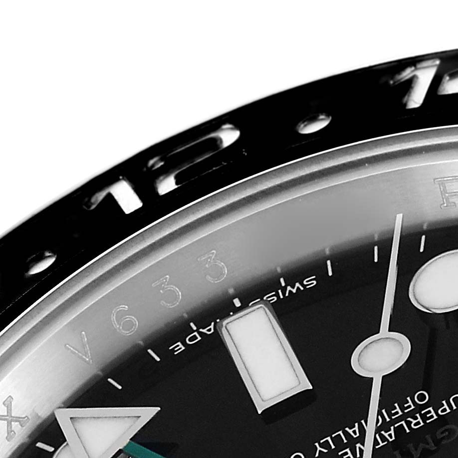 This image shows a close-up of the dial and bezel of a Rolex GMT-Master 116710 Men
s Stainless Steel Black Dial 116710 Men
s Stainless Steel Black Dial watch, highlighting the markers and text.