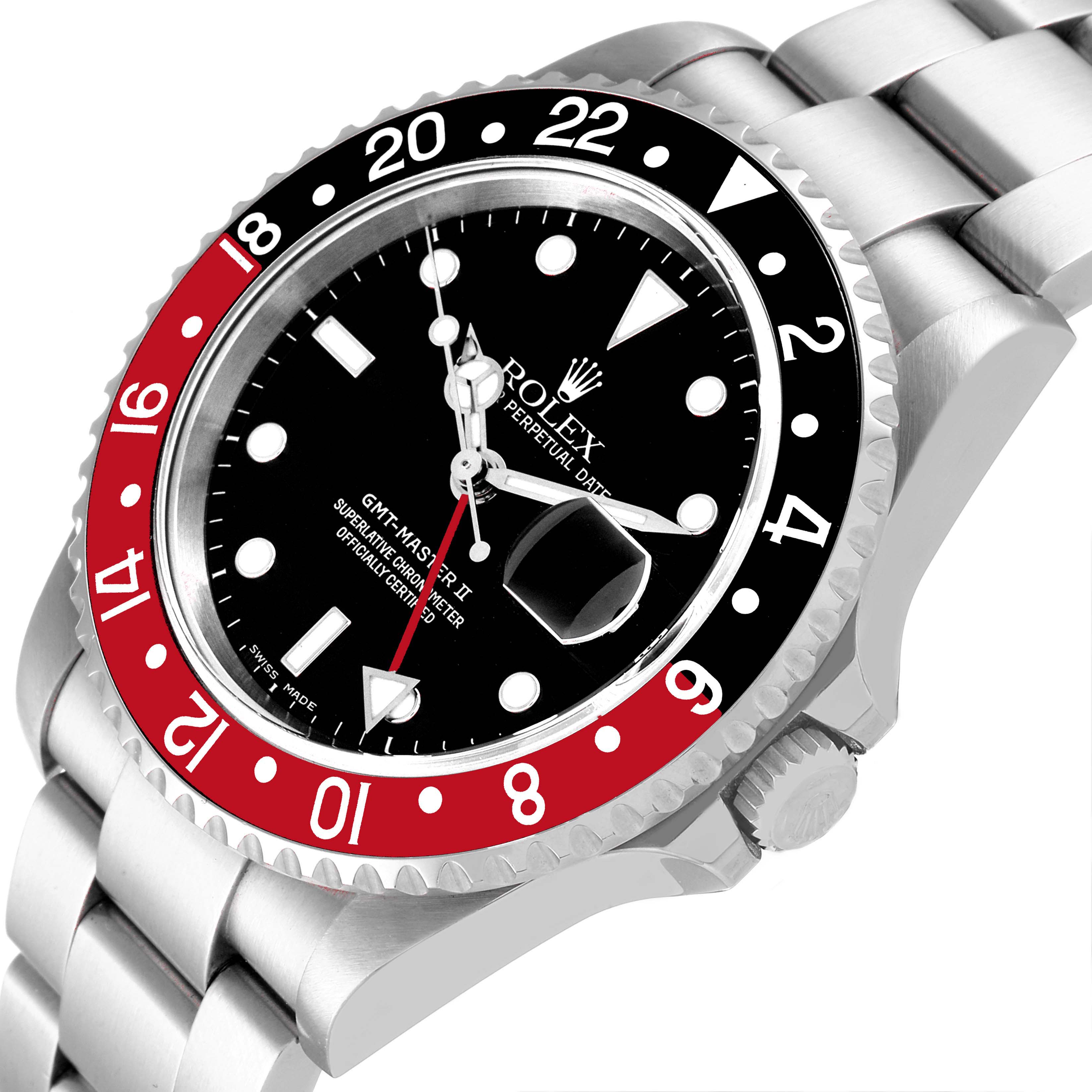 The image shows a close-up of a Rolex GMT-Master 16710 Men
s Stainless Steel Black Dial 16710 Men
s Stainless Steel Black Dial watch, highlighting its black and red bezel, black dial, and part of the stainless steel bracelet.