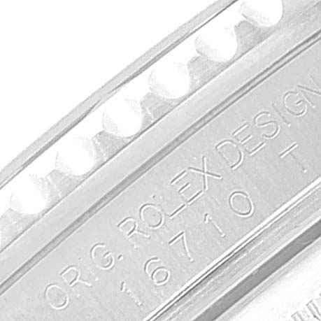 This image shows a close-up view of the engraved side of the Rolex GMT-Master 16710 Men
s Stainless Steel Black Dial 16710 Men
s Stainless Steel Black Dial watch model 16710.