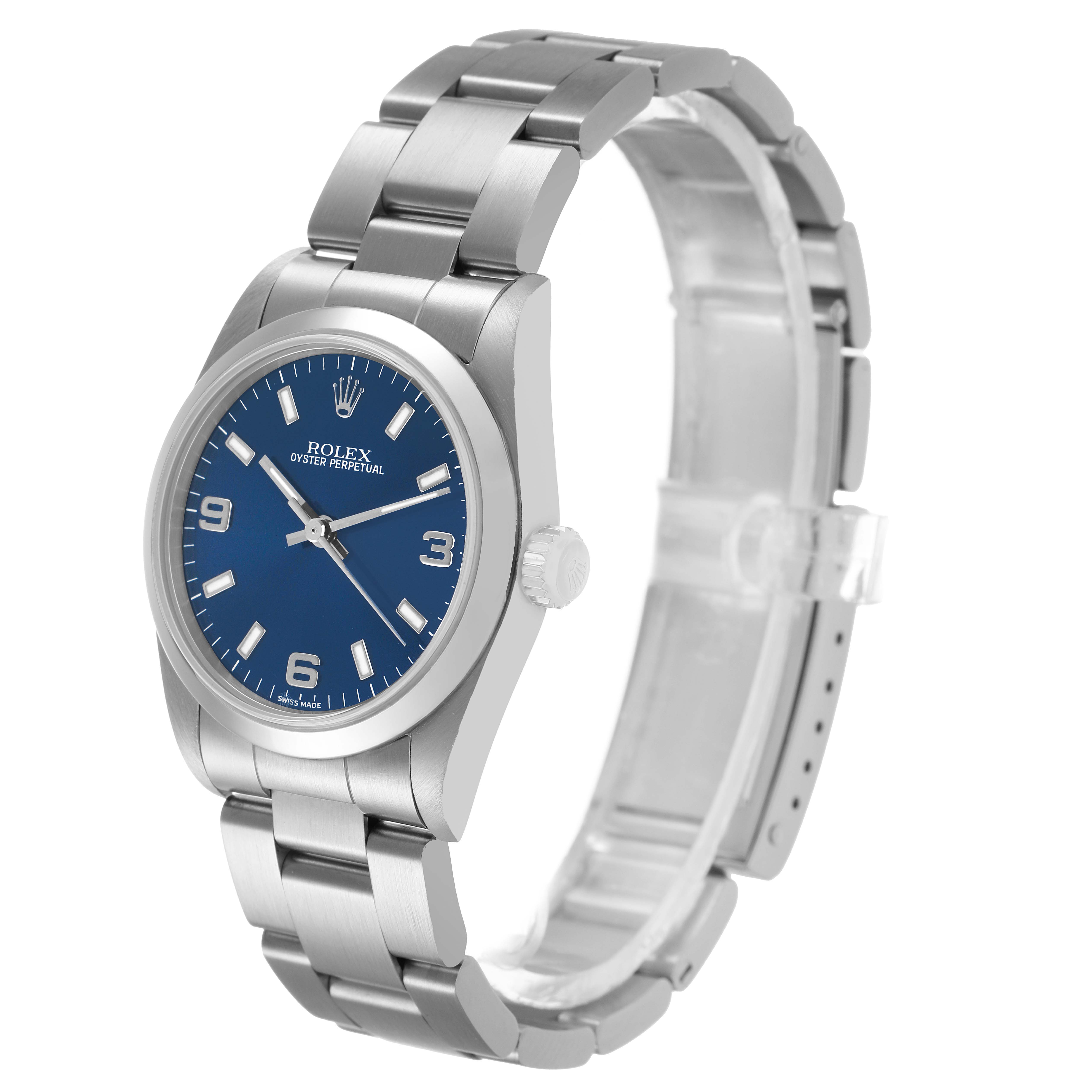 The Rolex Mid-Size 77080 Women's Stainless Steel Blue Dial watch is shown at a three-quarter angle, displaying the dial, bezel, crown, and bracelet.
