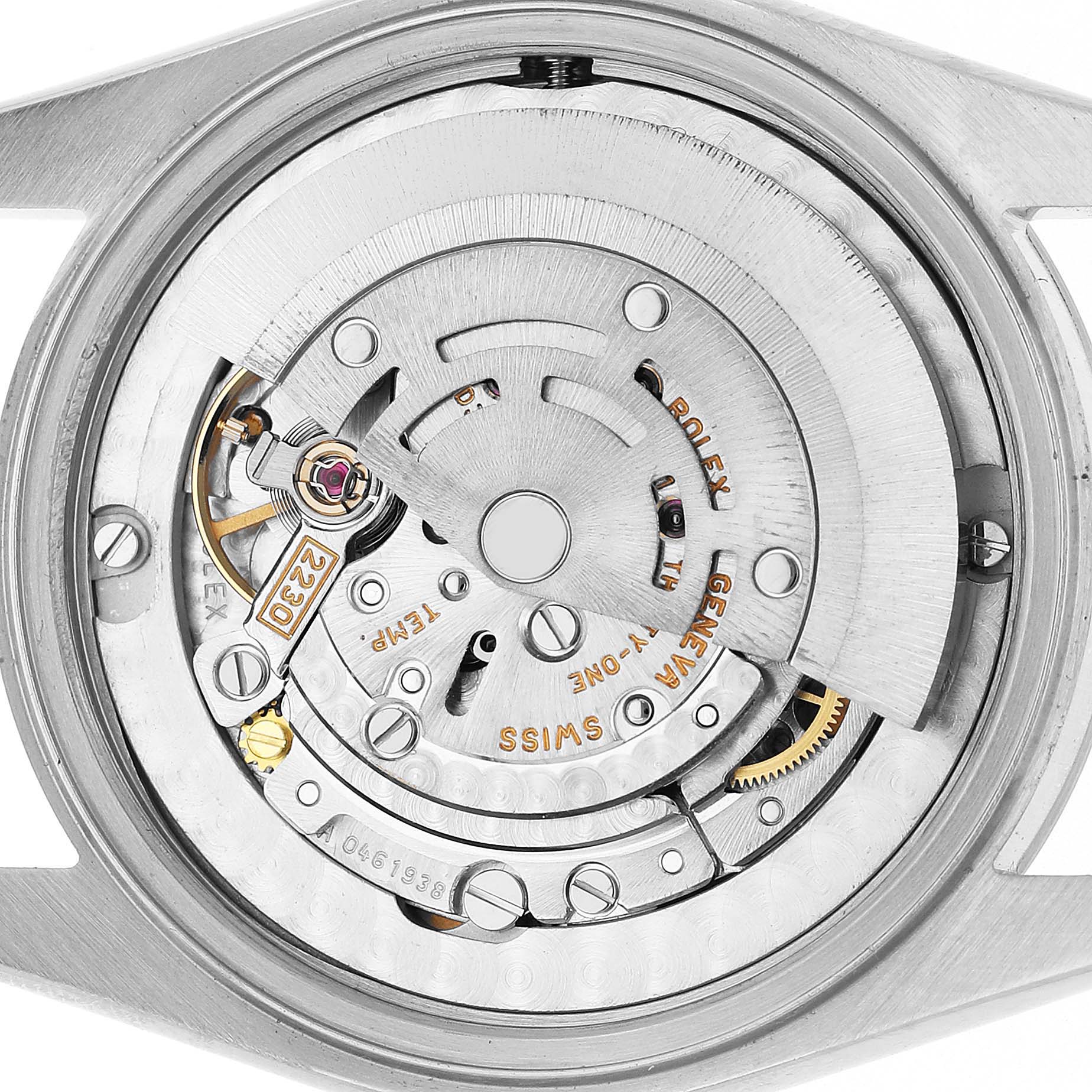 The image shows the internal mechanism of a Rolex Mid-Size 77080 Women's Stainless Steel Blue Dial watch from a top-down angle.
