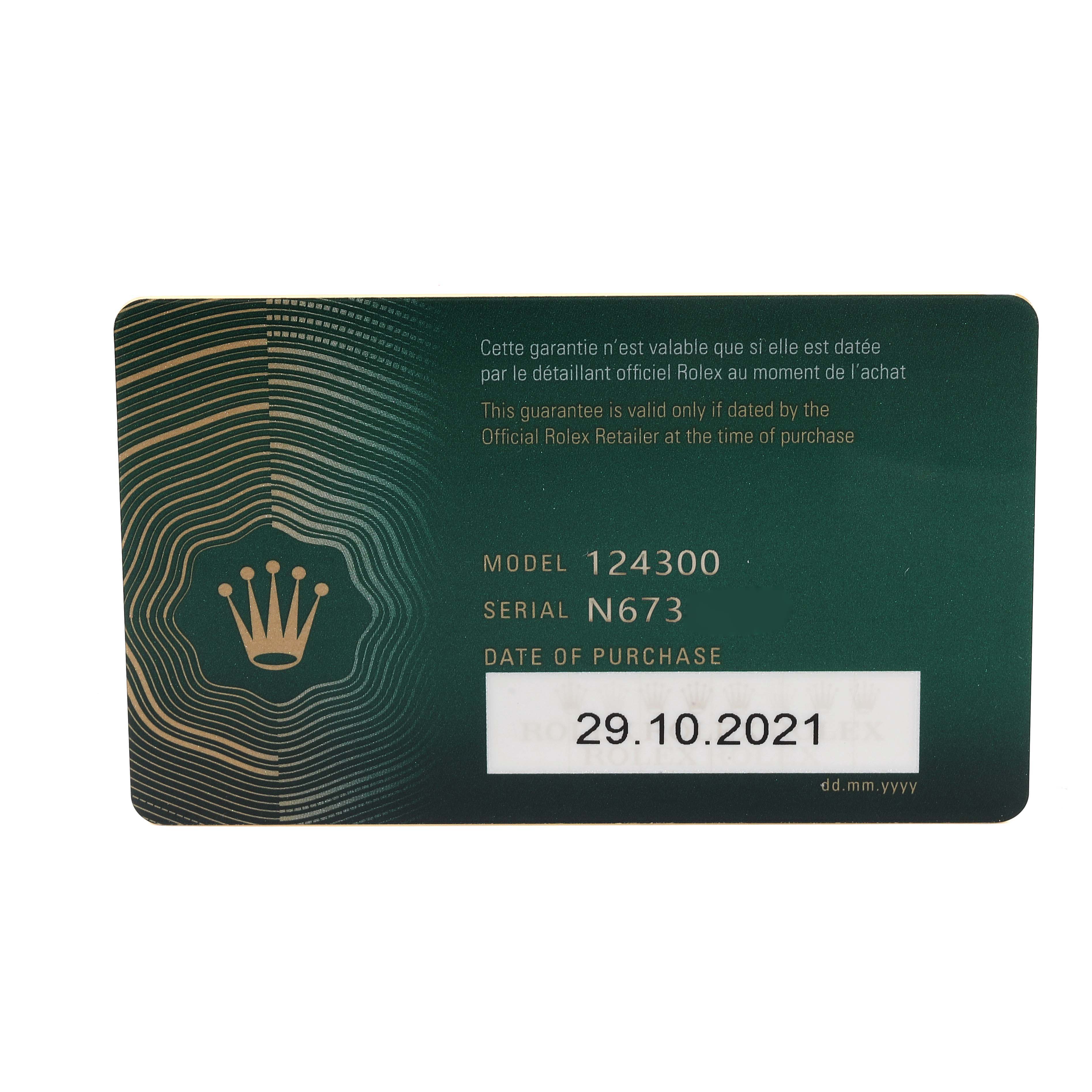 The image shows a guarantee card for the Rolex Oyster Perpetual 124300 Men's Stainless Steel Silver Dial 124300 Men's Stainless Steel Silver Dial model 124300.