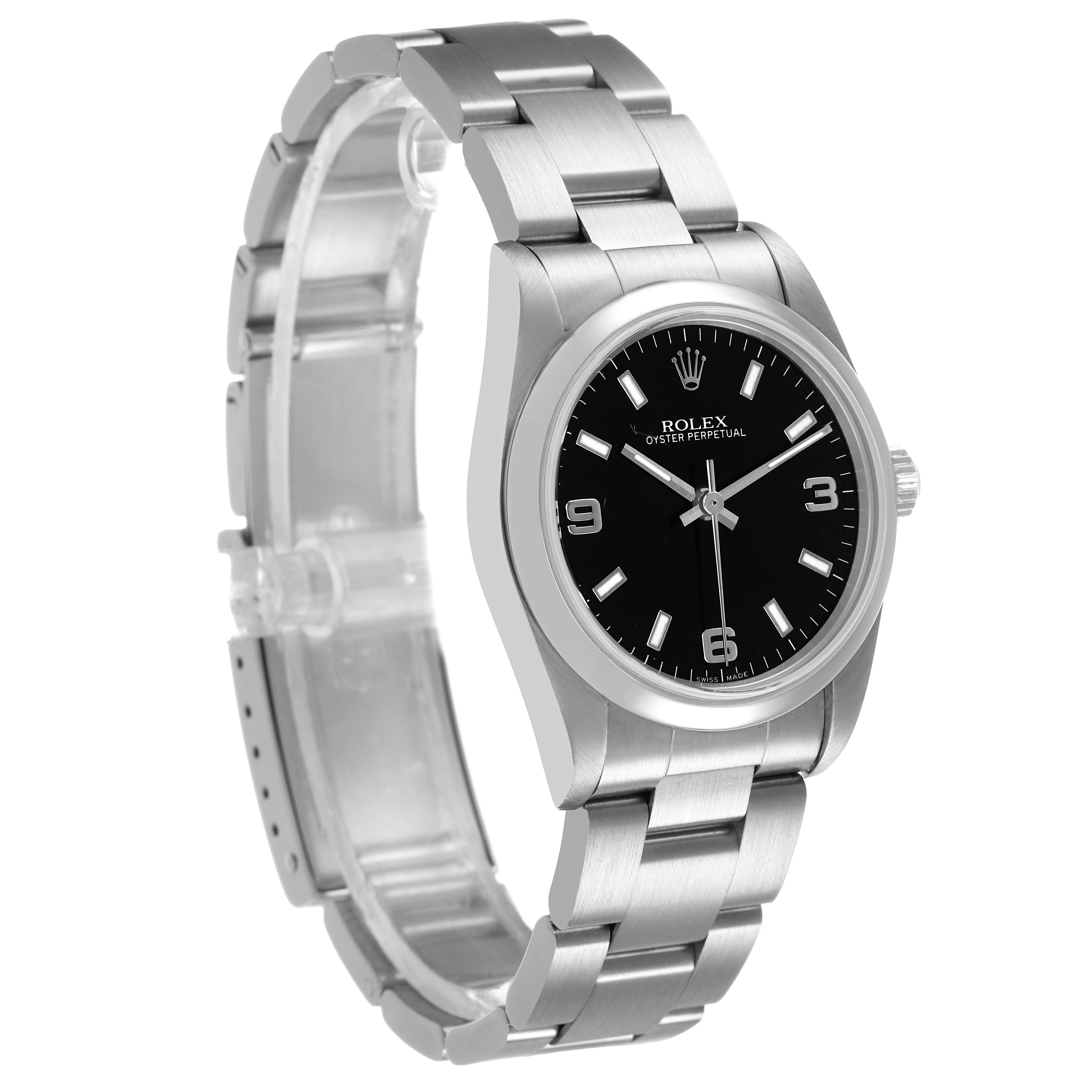 The Rolex Oyster Perpetual 77080 Women's Stainless Steel Black Dial watch is shown at a three-quarter angle, displaying its face, bezel, crown, and bracelet.