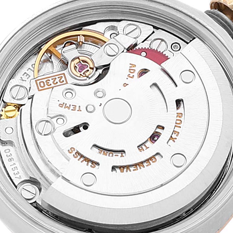 This image shows a close-up view of the movement mechanism of a Rolex Oyster Perpetual 76193 Women's Steel and Gold (two tone) Silver Dial 76193 Women's Steel and Gold (two tone) Silver Dial watch.