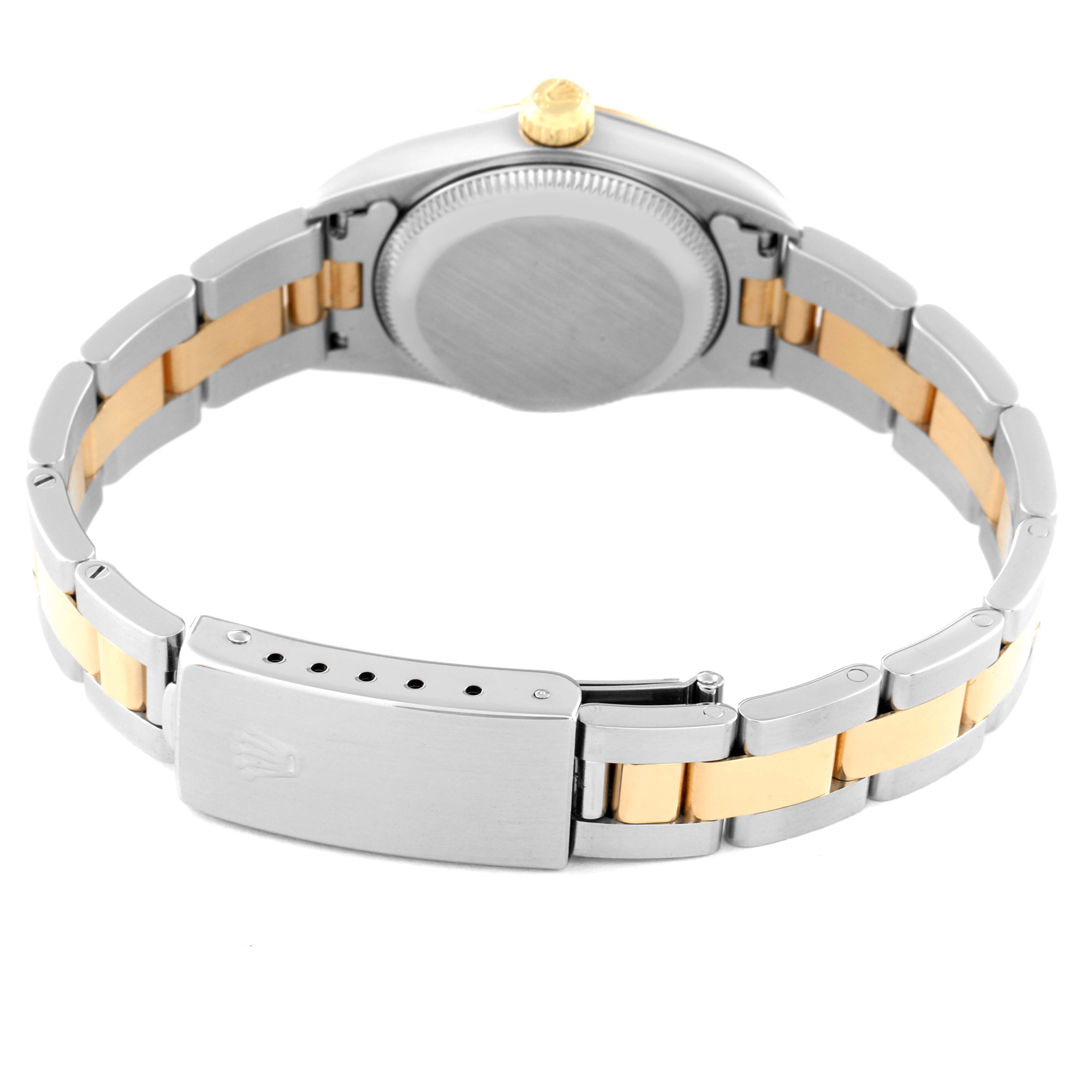 This image shows the backside and bracelet of the Rolex Oyster Perpetual 76193 Women's Steel and Gold (two tone) Silver Dial 76193 Women's Steel and Gold (two tone) Silver Dial watch, highlighting the clasp and caseback.