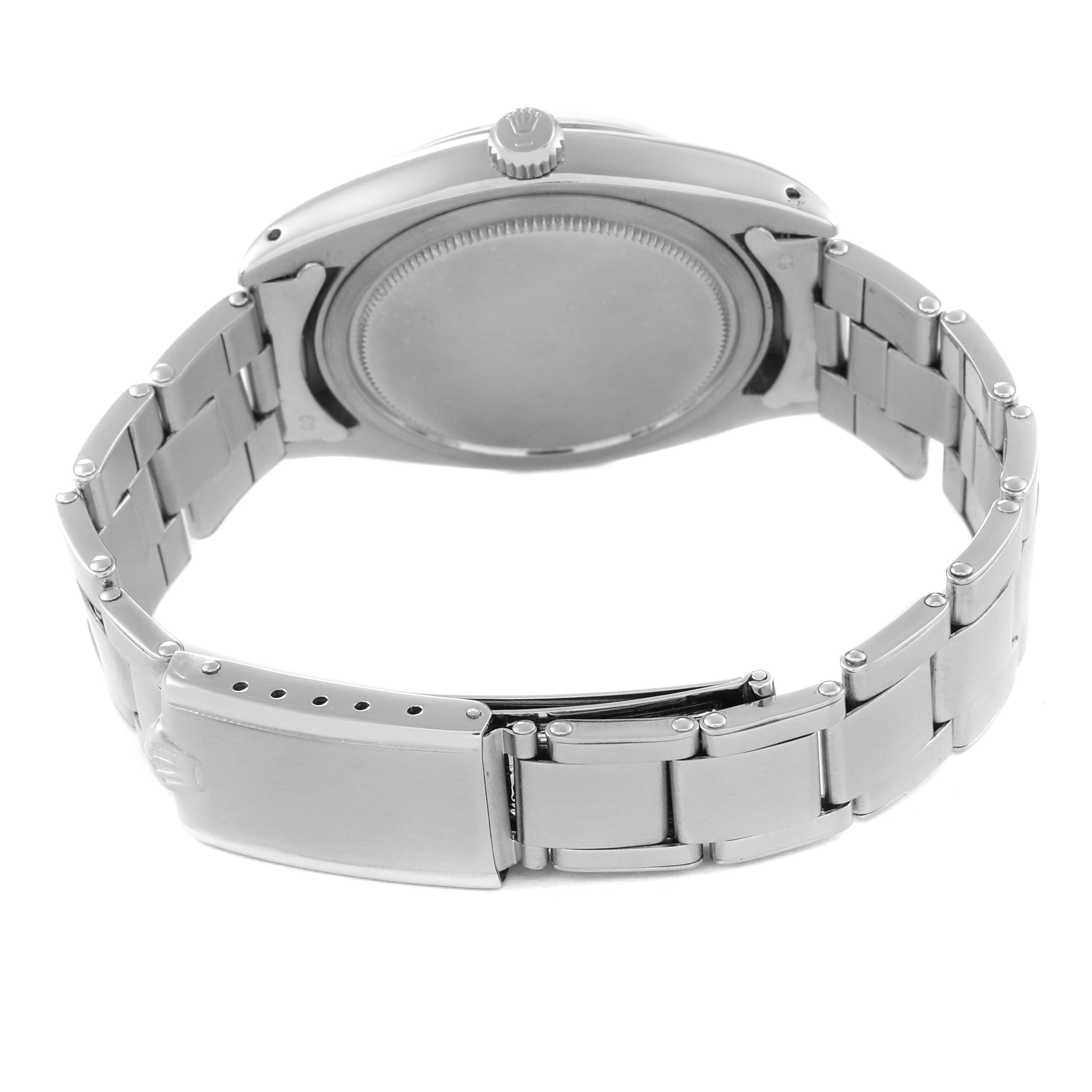 This image shows the back case and bracelet of a Rolex Vintage Collection 6694 Men's Stainless Steel Silver Dial 6694 Men's Stainless Steel Silver Dial watch from a rear angle.