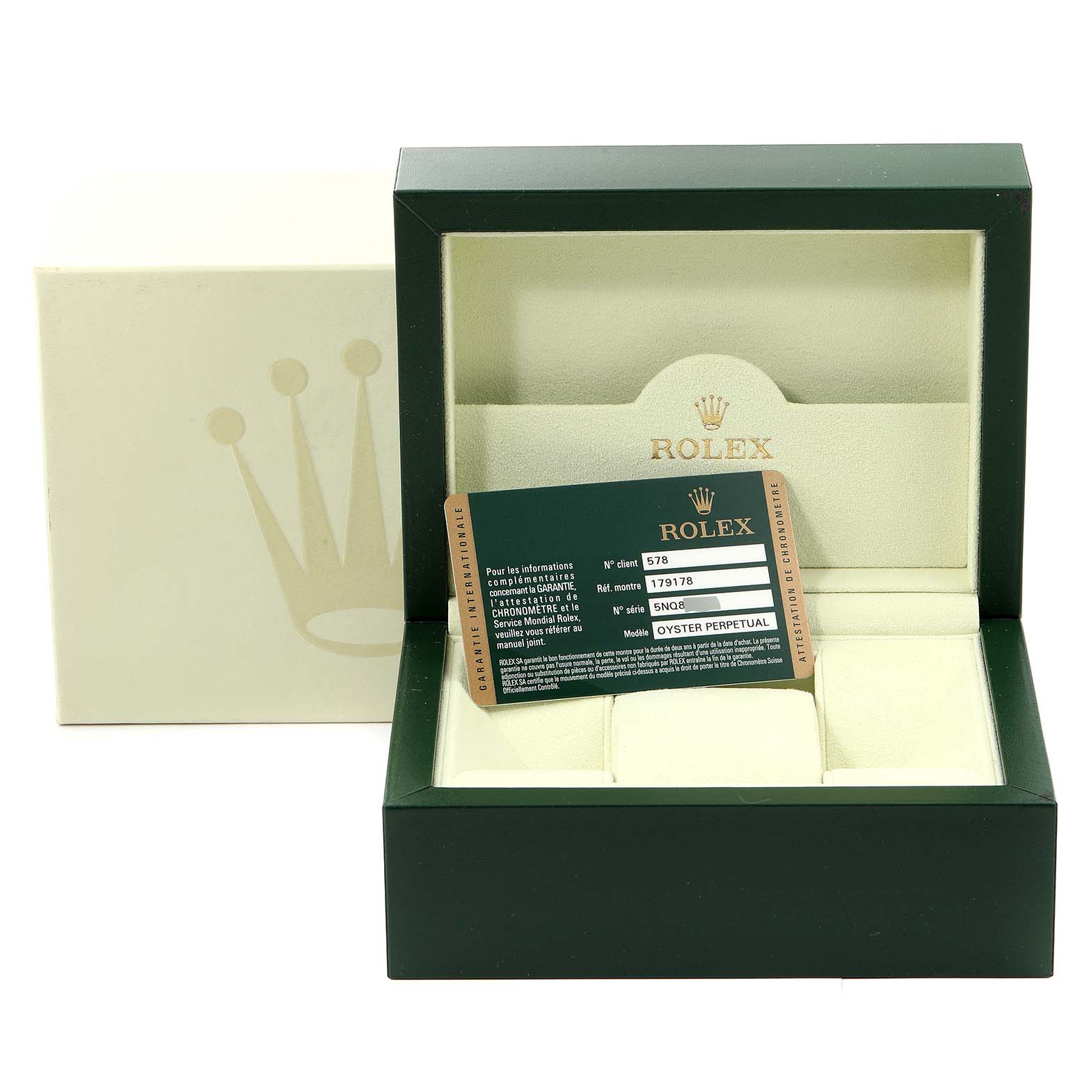 The image shows the packaging and warranty card for a Rolex President 179178 Women
s Yellow Gold Champagne Dial 179178 Women
s Yellow Gold Champagne Dial model watch from a frontal angle.